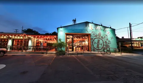 a view of a building with brick walls
