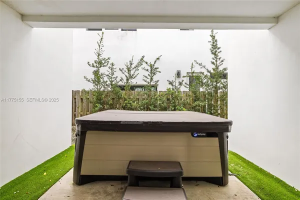 a room with a bed and a window