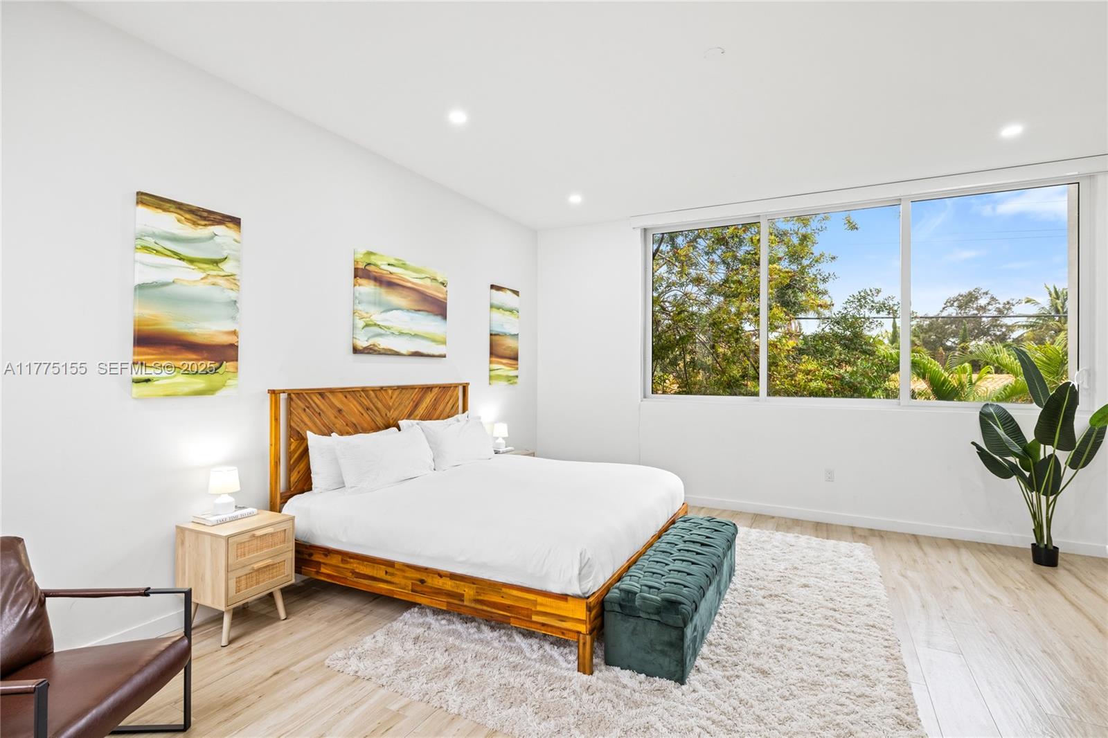 1816 Southwest 23rd Street Miami, FL 33145 - Photo 25 of 34 a bedroom with a bed and a window