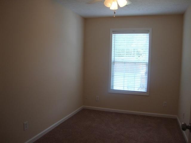 1002 Division Street, Unit 1002 Murfreesboro, TN 37130 - Photo 11 of 15 an empty room with a window