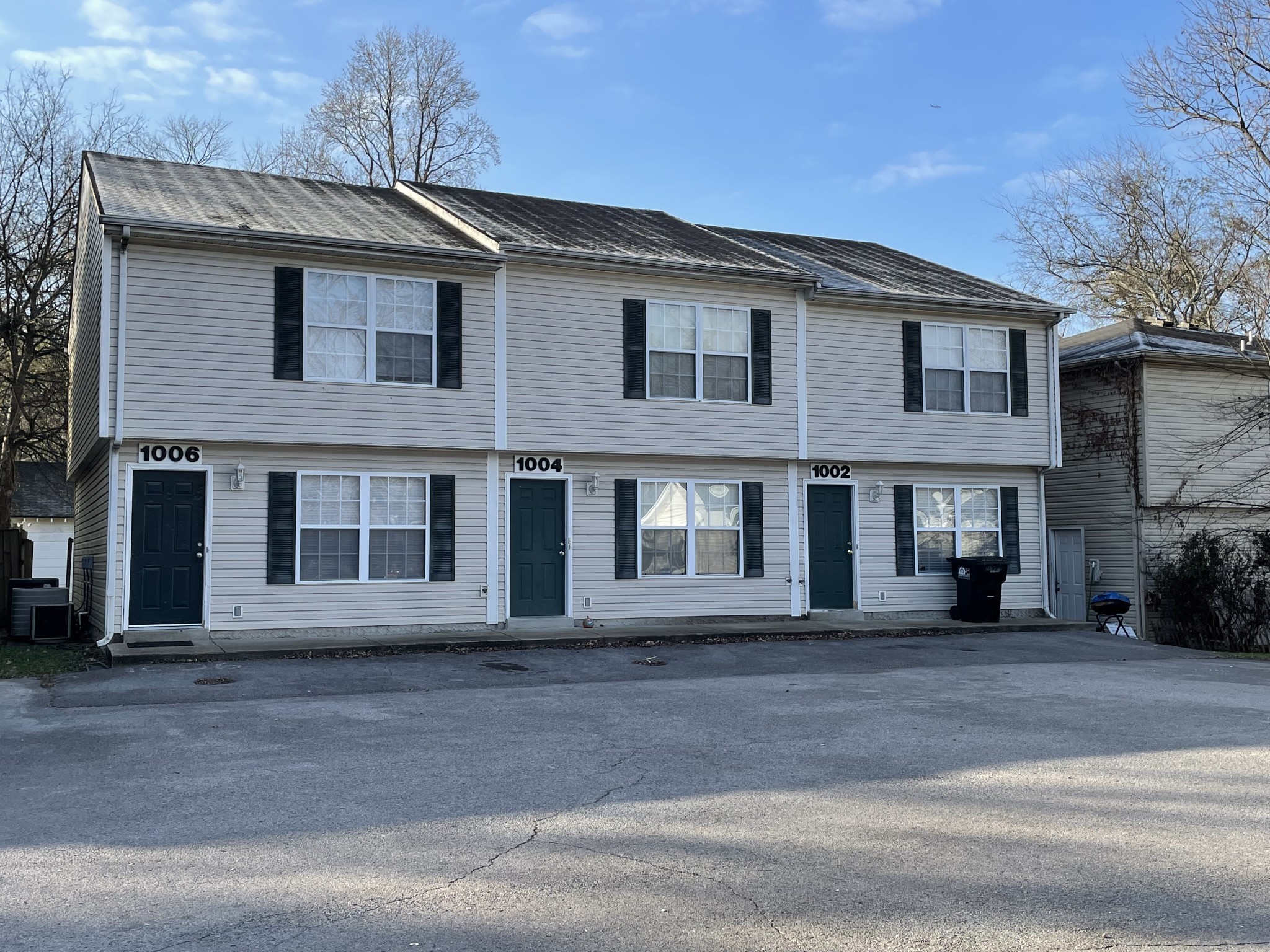 1002 Division Street, Unit 1002 Murfreesboro, TN 37130 - Photo 2 of 15 a front view of residential houses
