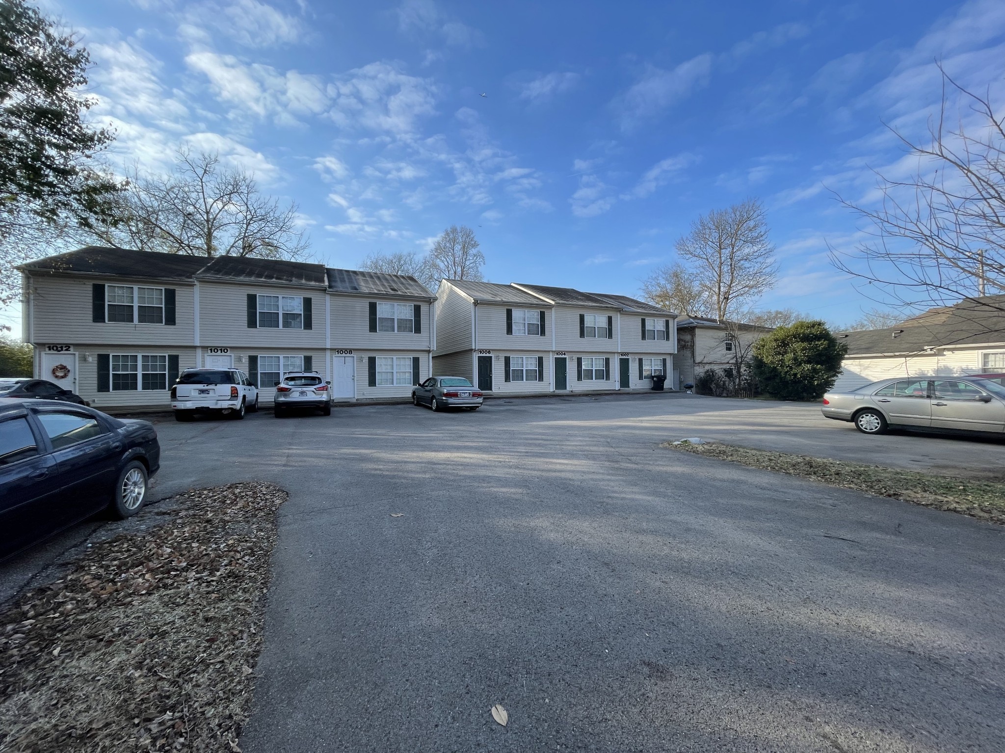 1002 Division Street, Unit 1002 Murfreesboro, TN 37130 - Photo 3 of 15 a view of a car park in front of a house