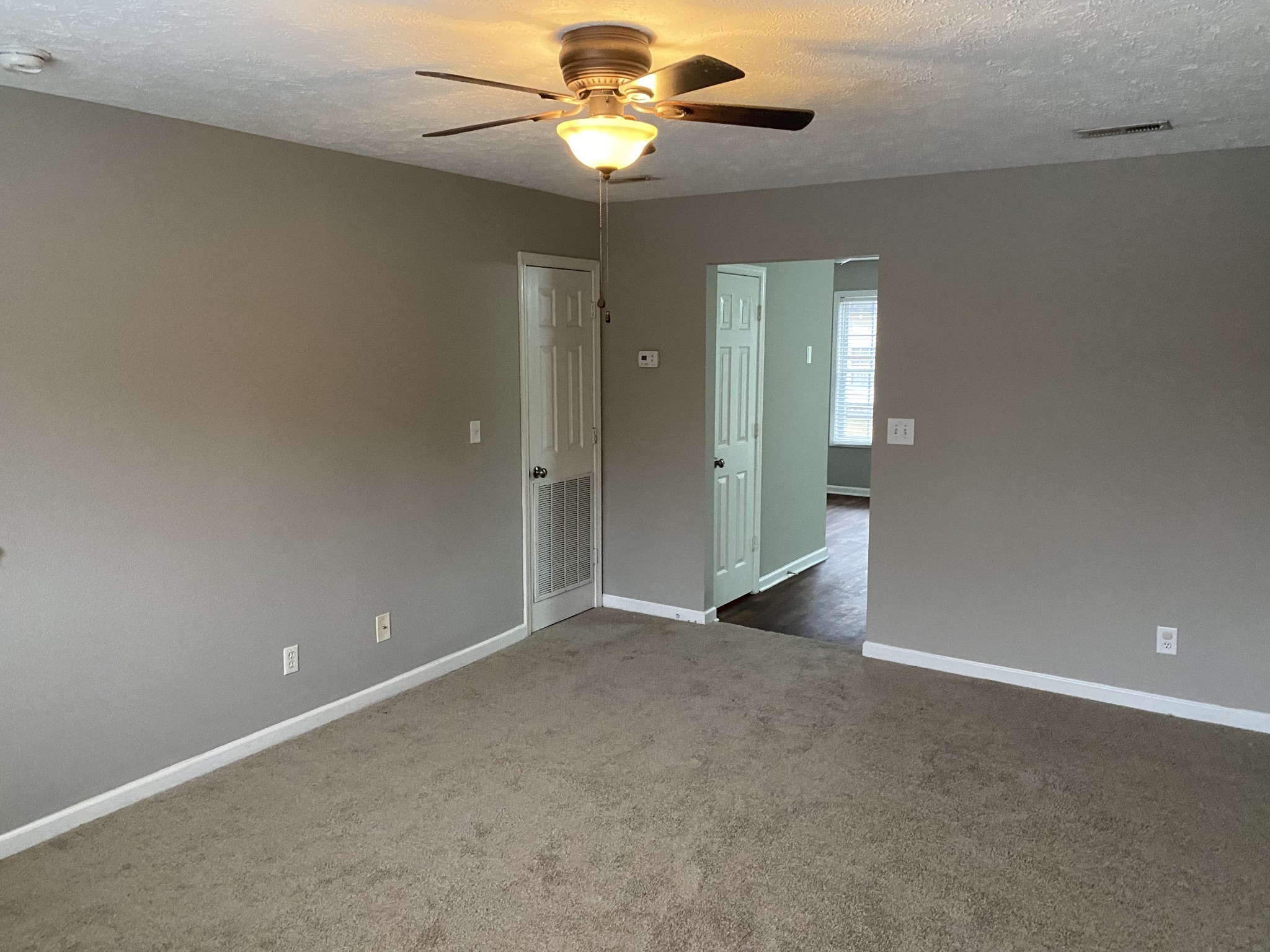 1002 Division Street, Unit 1002 Murfreesboro, TN 37130 - Photo 5 of 15 a view of an empty room with a window