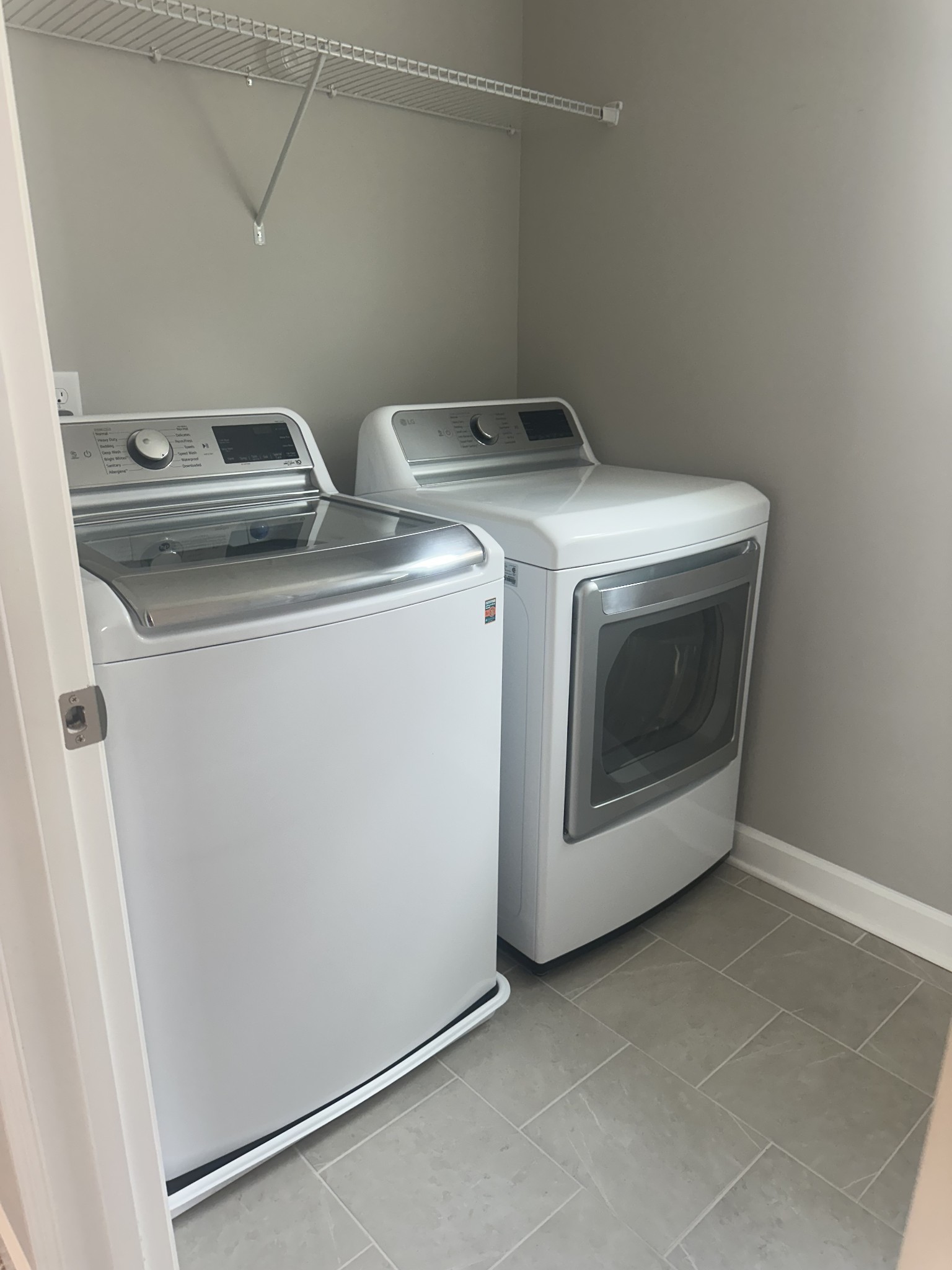 1721 Fenway Loop Antioch, TN 37013 - Photo 21 of 35 a utility room with dryer and washer
