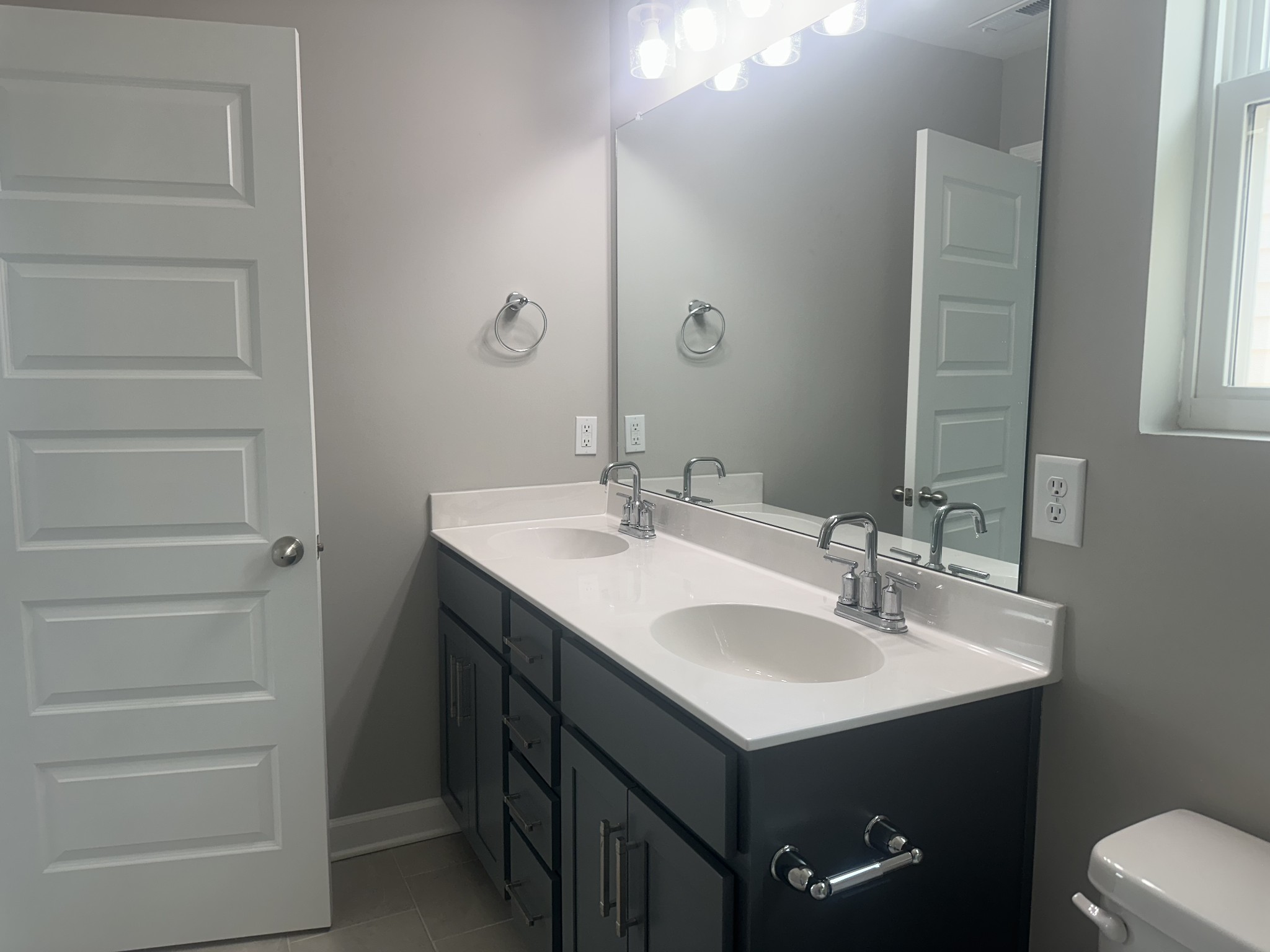 1721 Fenway Loop Antioch, TN 37013 - Photo 26 of 35 a bathroom with a sink and a mirror