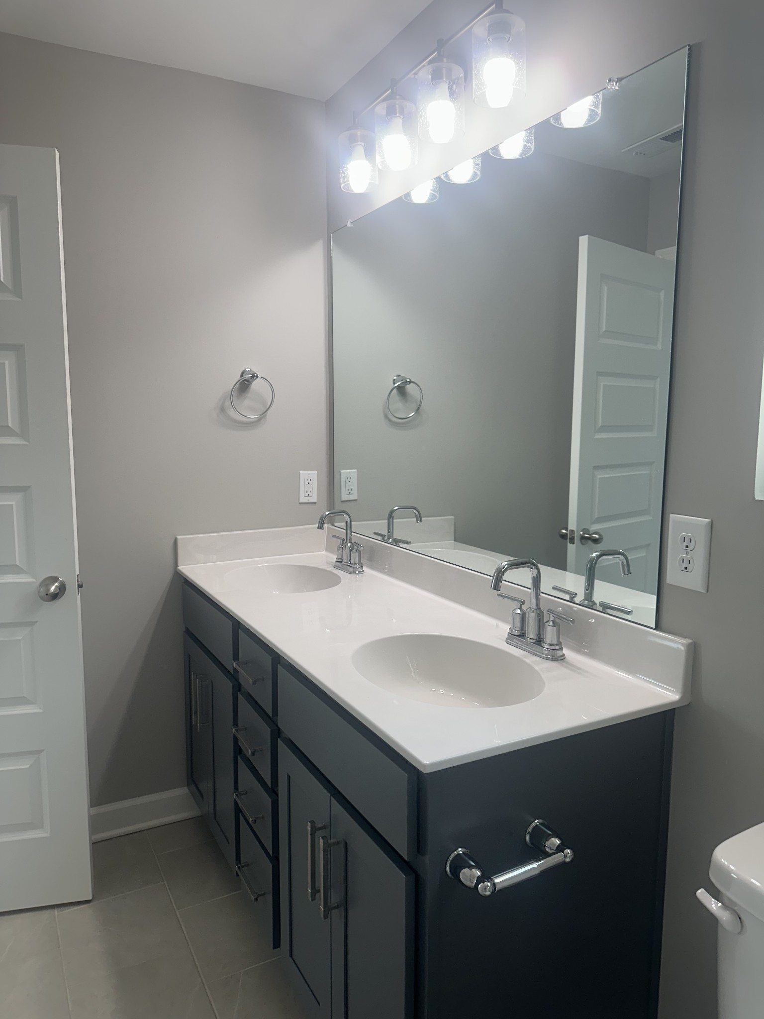 1721 Fenway Loop Antioch, TN 37013 - Photo 27 of 35 a bathroom with a sink double vanity and a mirror