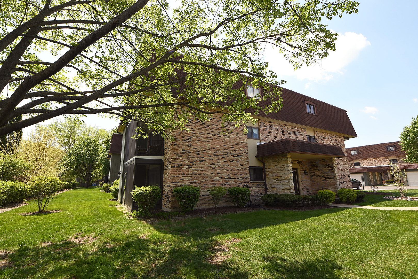 11137 E Road, Unit E Palos Hills, IL 60465 - Photo 2 of 34 a view of a house with a yard