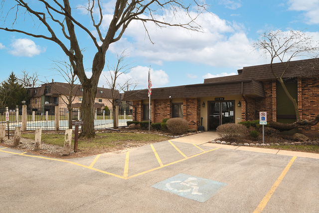 11137 E Road, Unit E Palos Hills, IL 60465 - Photo 28 of 34 a view of a house with a patio