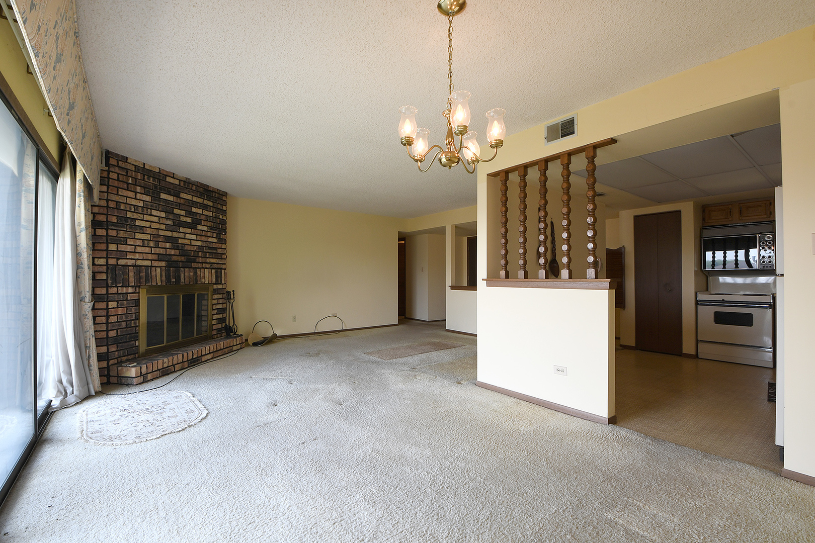 11137 E Road, Unit E Palos Hills, IL 60465 - Photo 8 of 34 a view of a kitchen with a sink and dishwasher cabinets
