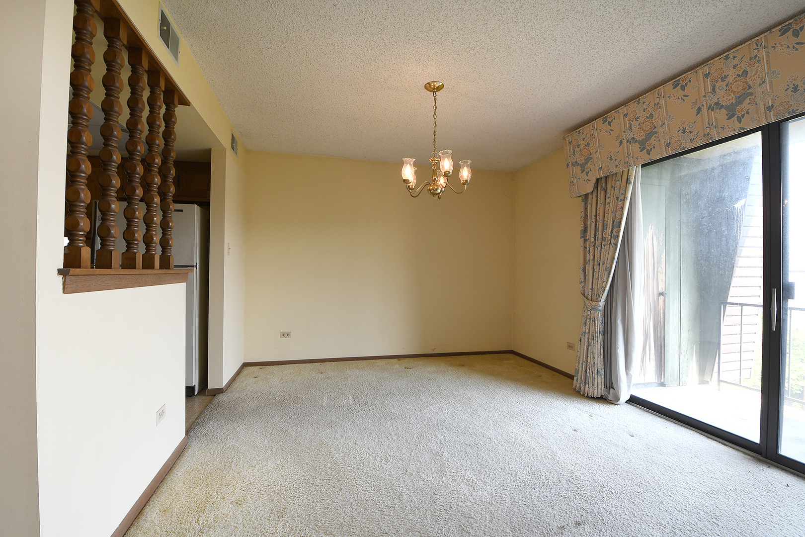 11137 E Road, Unit E Palos Hills, IL 60465 - Photo 9 of 34 a view of an empty room with a window