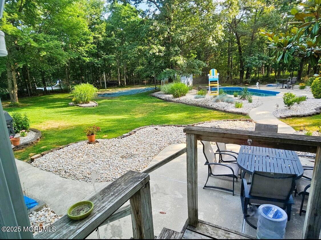 45 South Stump Tavern Road Jackson, NJ 08527 - Photo 54 of 60 a view of a backyard with sitting area