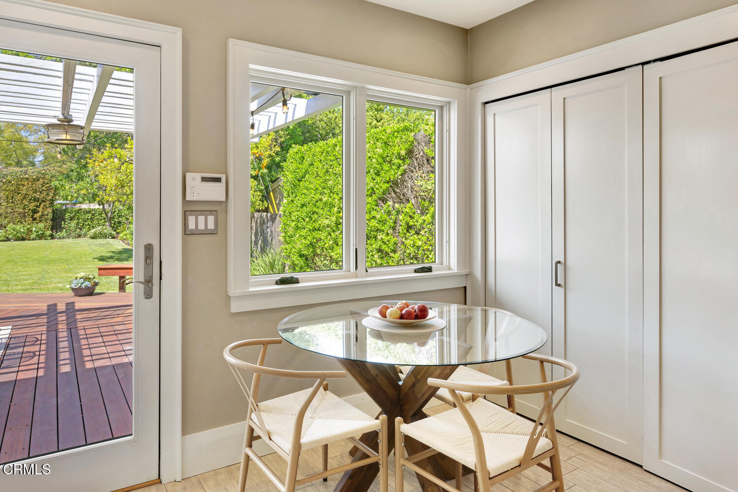 465 Alpine Street Pasadena, CA 91106 - Photo 11 of 45 a view of a dining room with furniture and a window