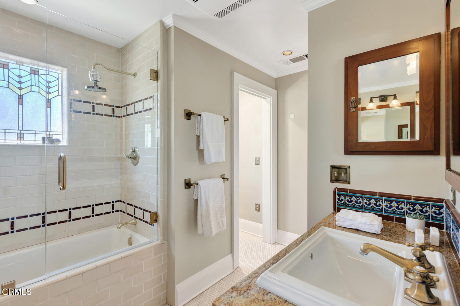 465 Alpine Street Pasadena, CA 91106 - Photo 24 of 45 a bathroom with a tub a sink and a shower