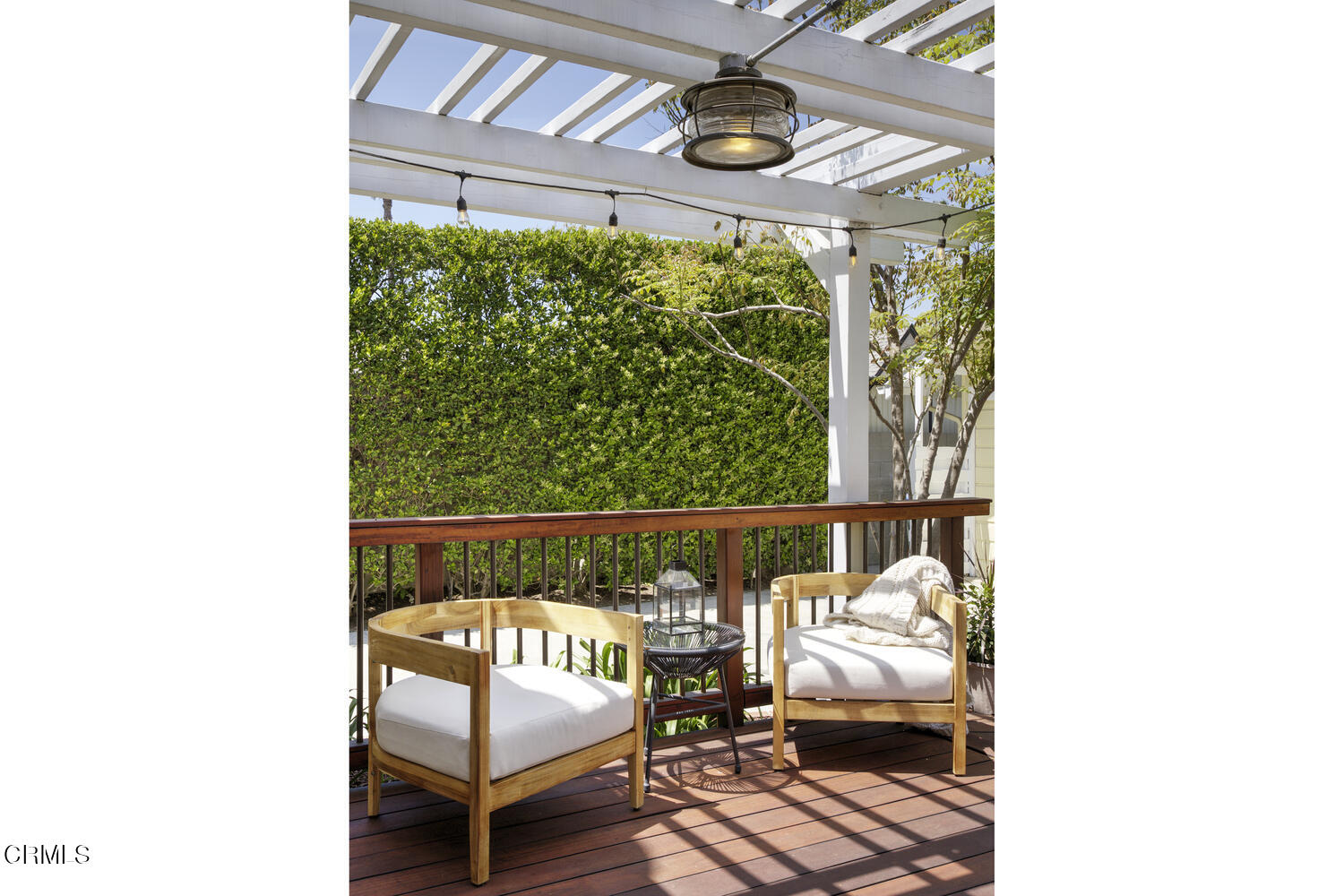 465 Alpine Street Pasadena, CA 91106 - Photo 31 of 45 a view of a hallway with wooden floor and a potted plant