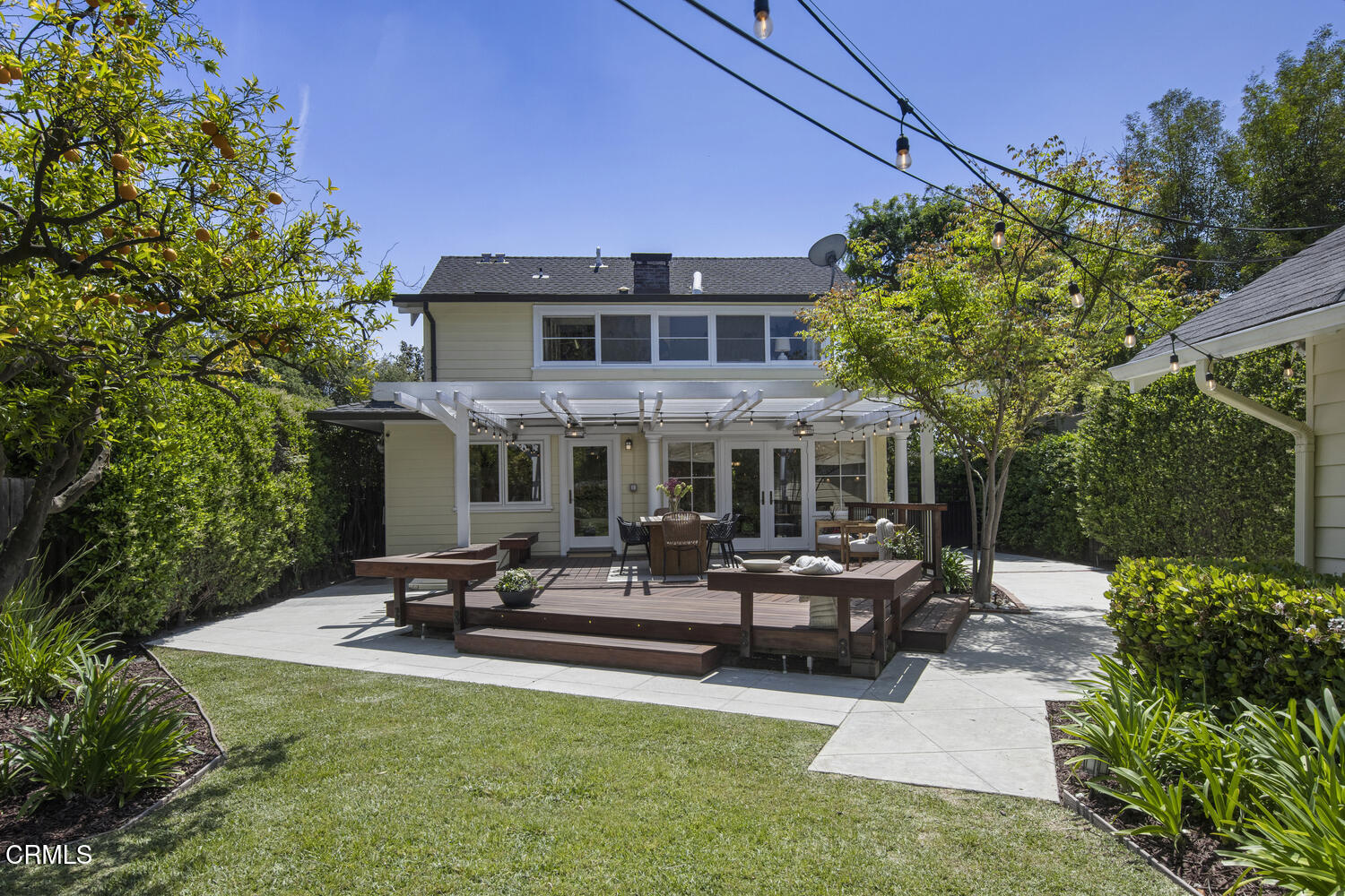 465 Alpine Street Pasadena, CA 91106 - Photo 33 of 45 a front view of a house with garden and sitting area