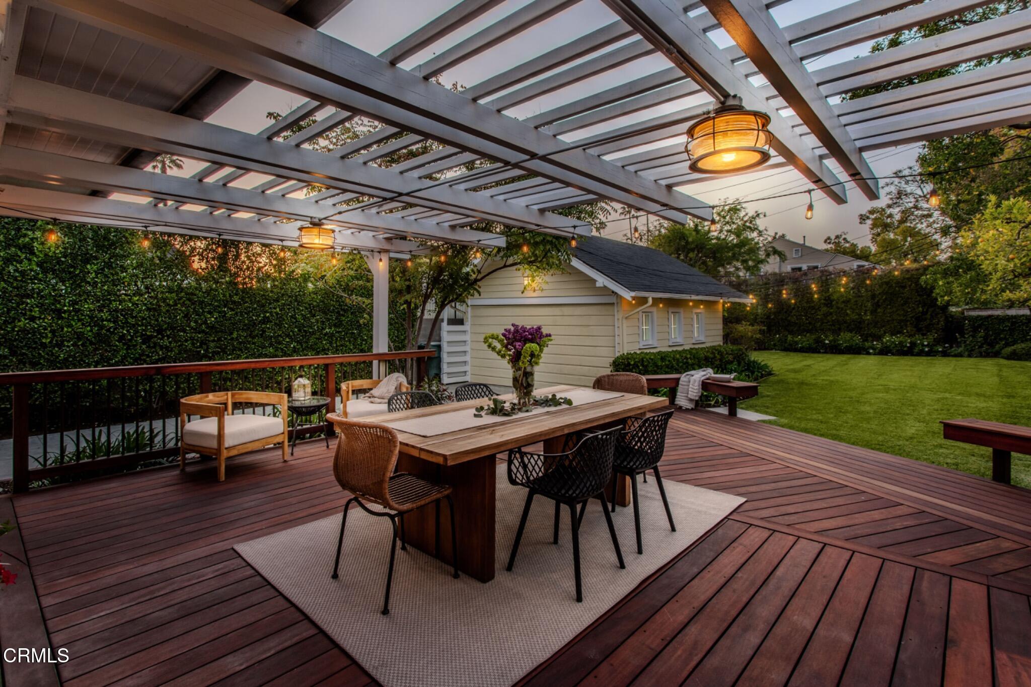 465 Alpine Street Pasadena, CA 91106 - Photo 36 of 45 a view of a table and chairs in patio with wooden floor