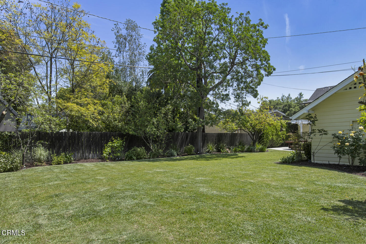 465 Alpine Street Pasadena, CA 91106 - Photo 41 of 45 a backyard of a house with lots of green space