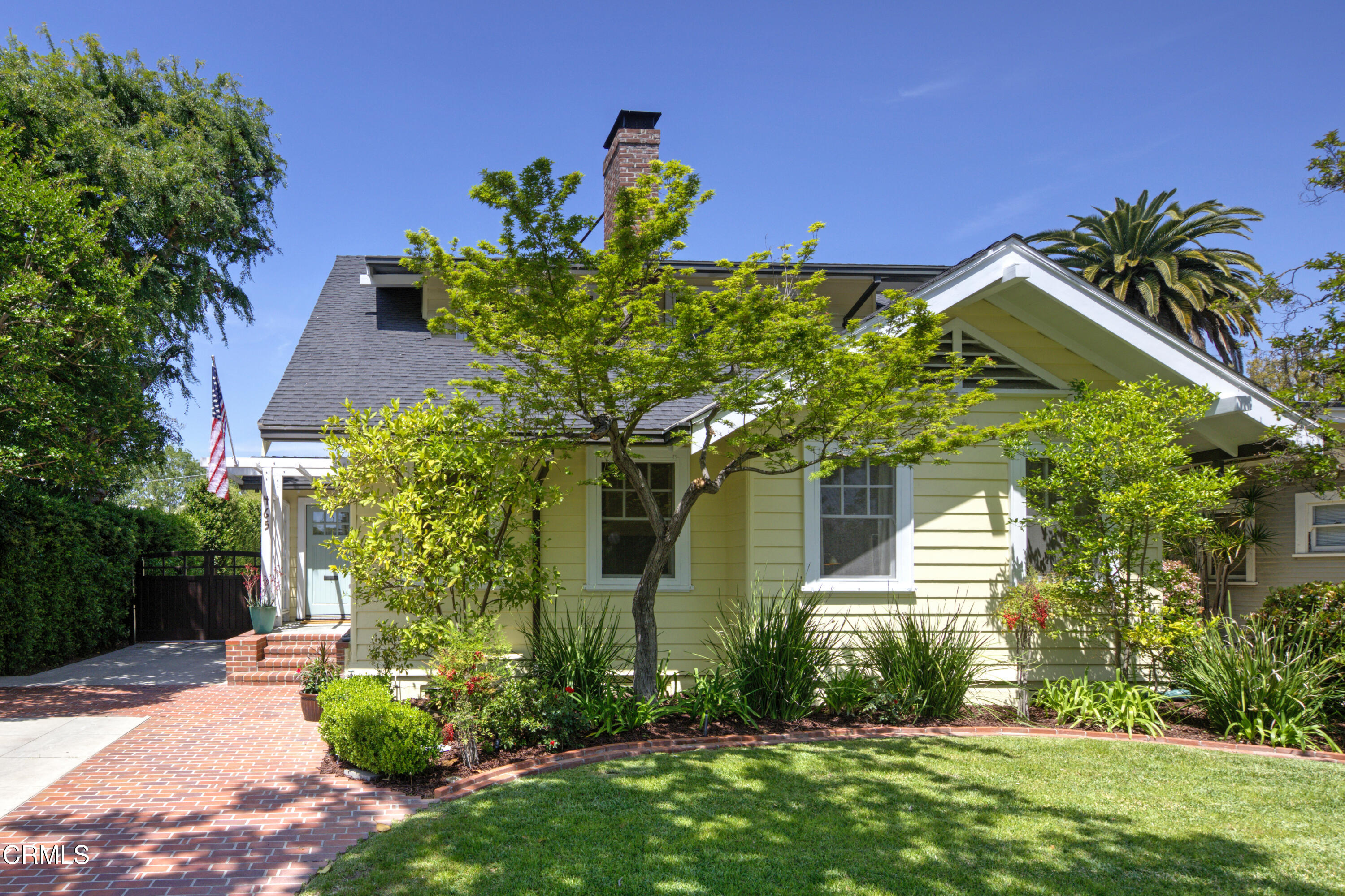 465 Alpine Street Pasadena, CA 91106 - Photo 44 of 45 a front view of a house with a yard