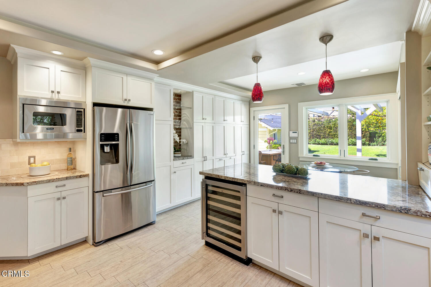 465 Alpine Street Pasadena, CA 91106 - Photo 10 of 45 a kitchen with granite countertop stainless steel appliances a refrigerator and a sink