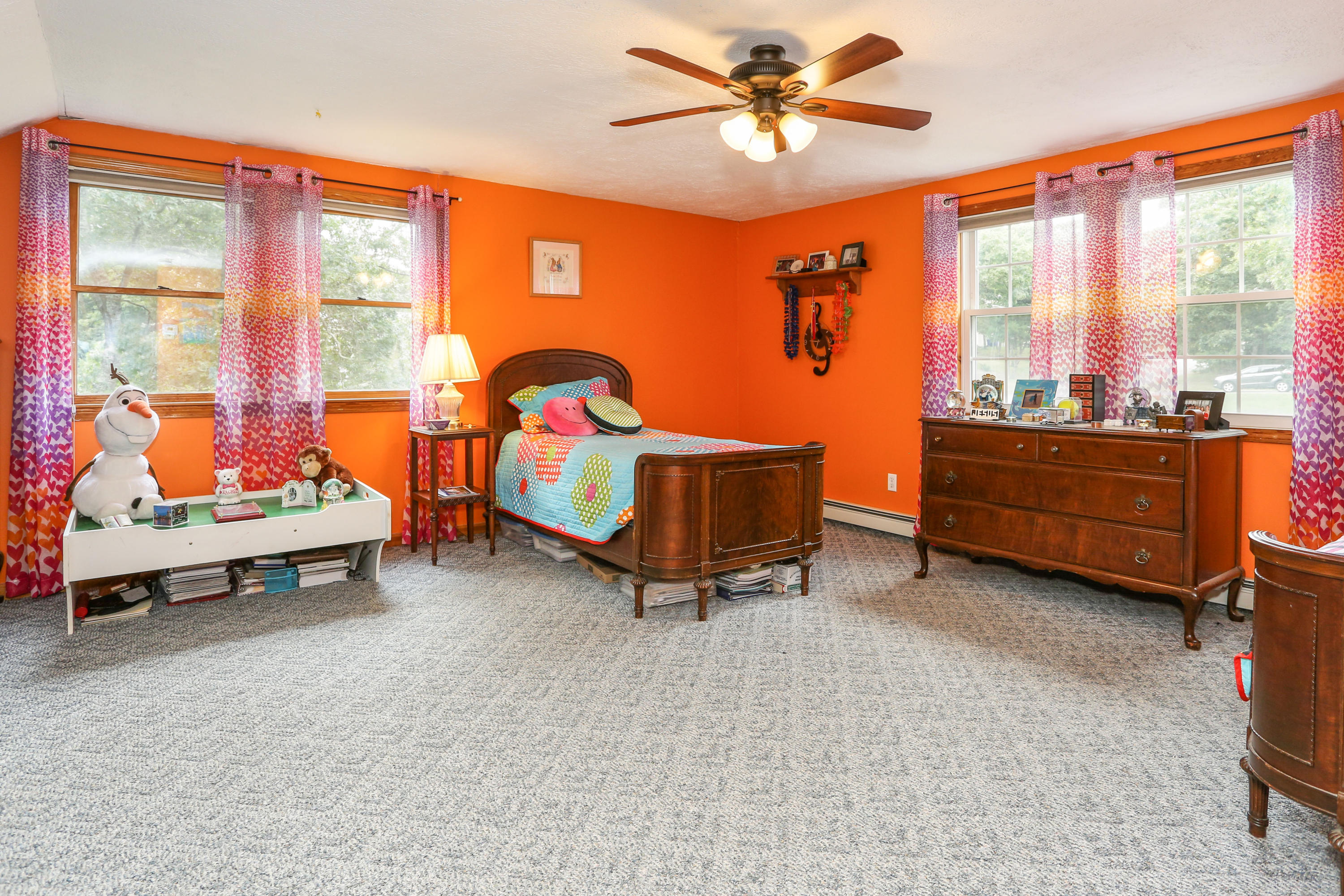 3 Andrew Road Sagamore Beach, MA 02562 - Photo 22 of 29 a living room with furniture a window and a ceiling fan