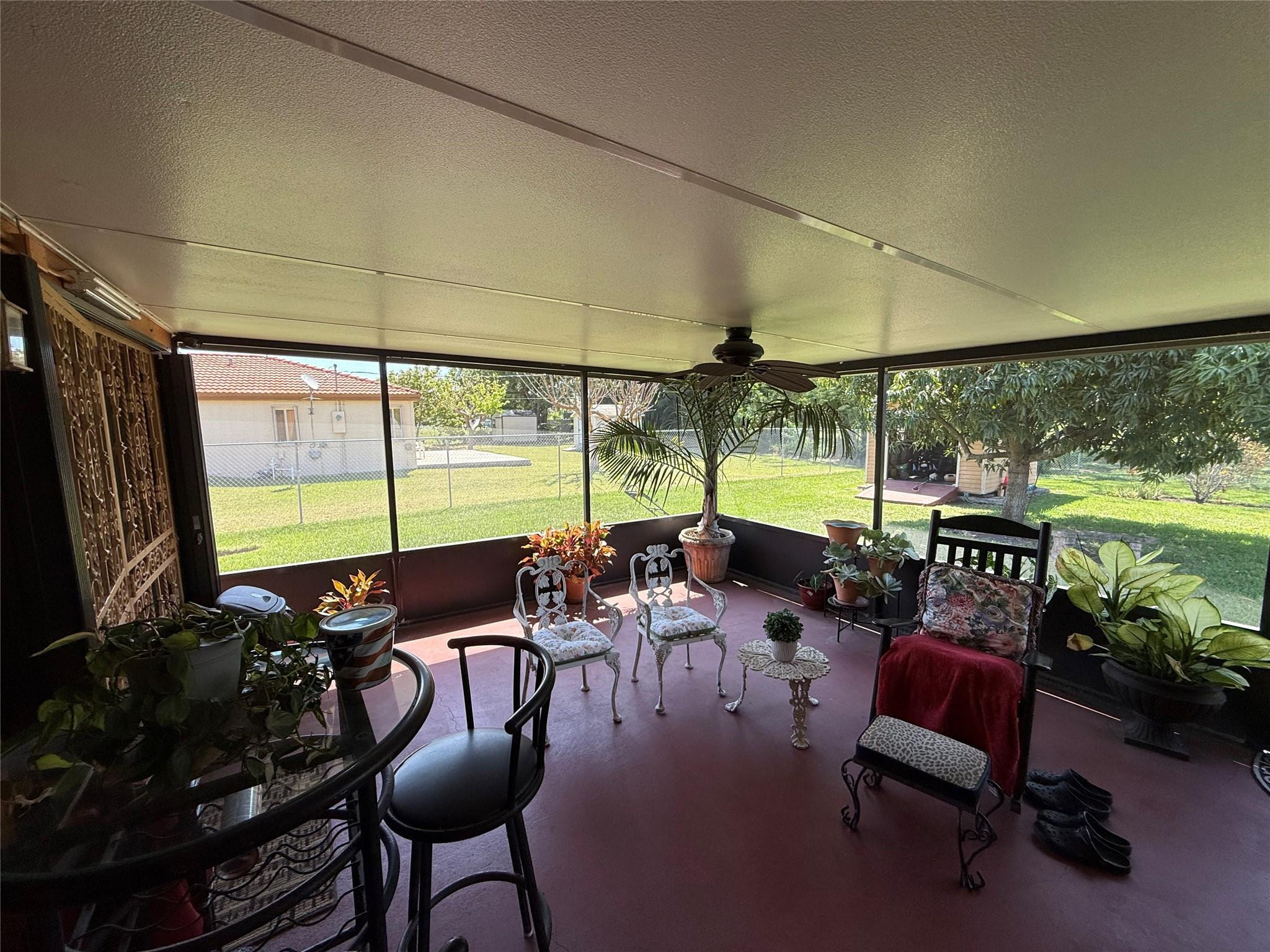 10262 Southwest 179th Street Miami, FL 33157 - Photo 8 of 26 Large Covered and Screened Patio