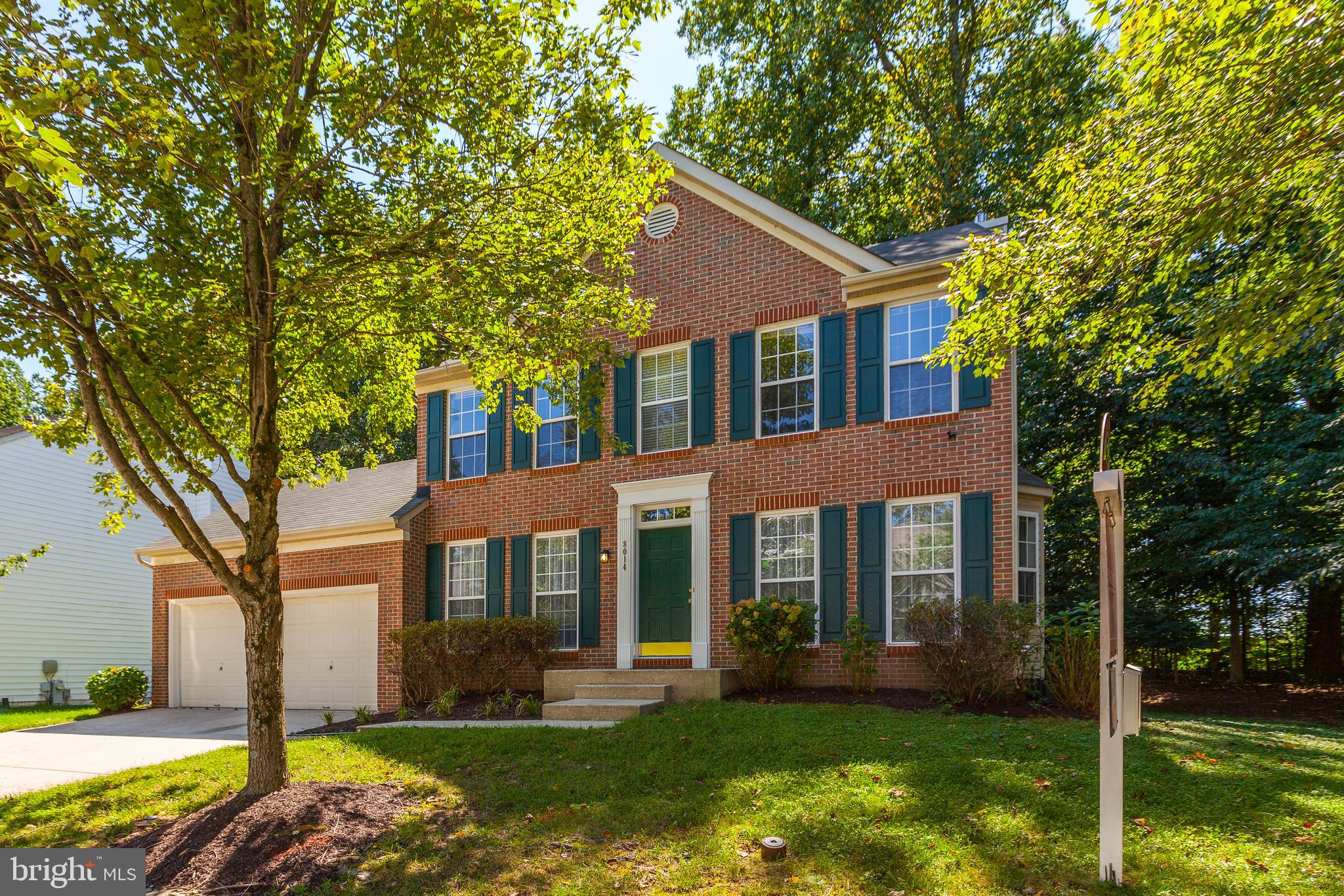 8014 Big Pool Road Laurel, MD 20724 - Photo 3 of 52 a front view of a house with yard and green space