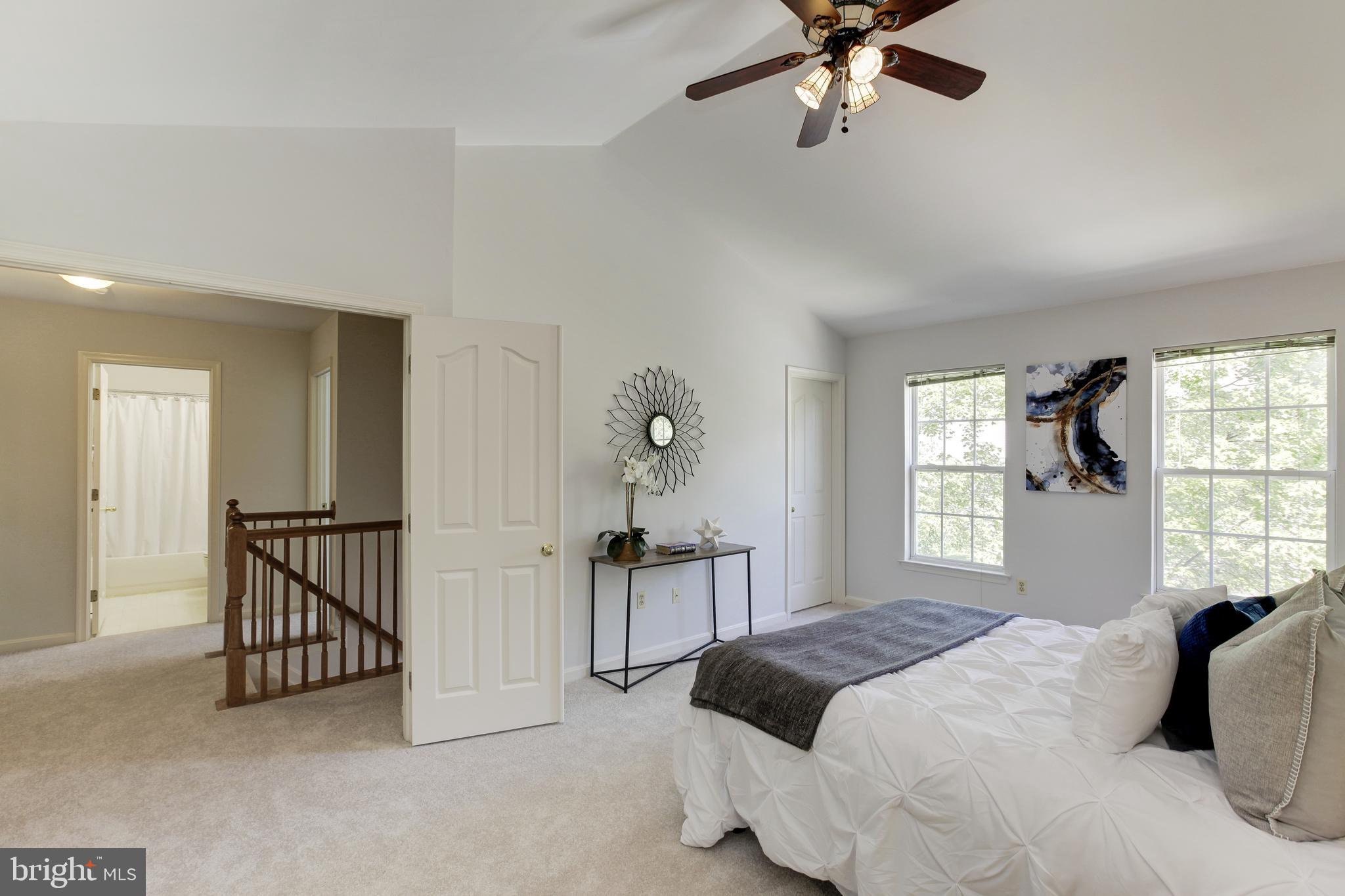 8014 Big Pool Road Laurel, MD 20724 - Photo 27 of 52 a bedroom with a bed and window