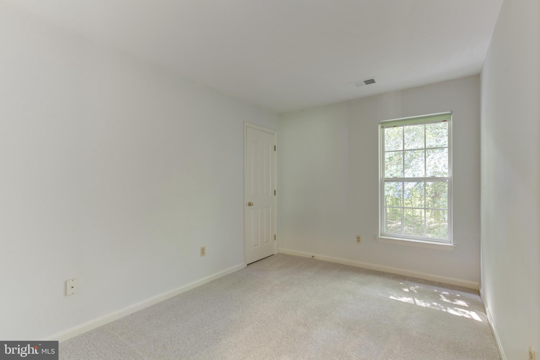 8014 Big Pool Road Laurel, MD 20724 - Photo 33 of 52 an empty room with a window