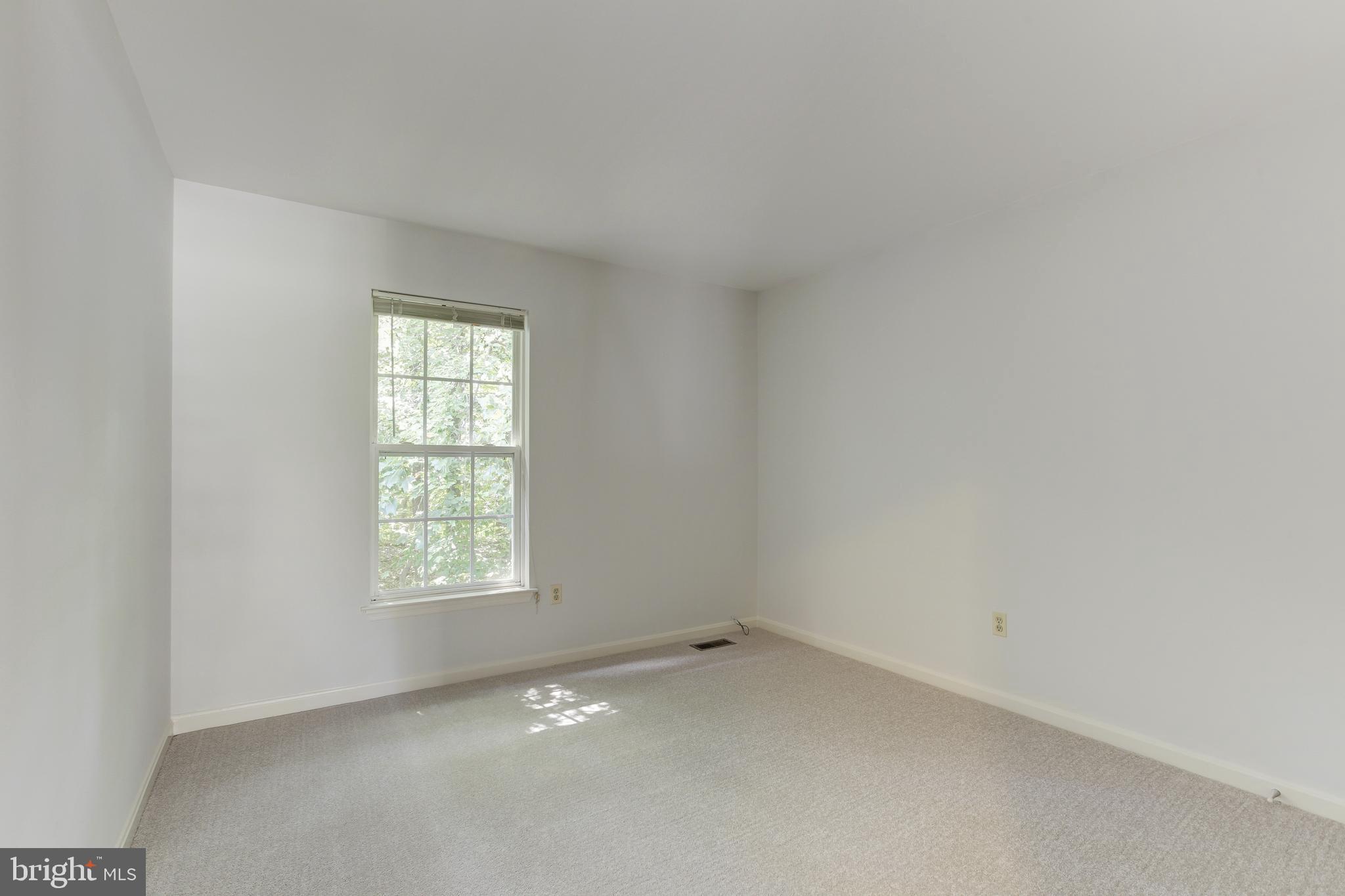 8014 Big Pool Road Laurel, MD 20724 - Photo 35 of 52 an empty room with a window