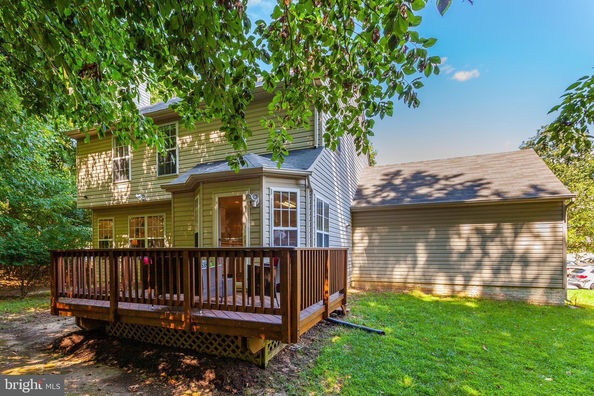 8014 Big Pool Road Laurel, MD 20724 - Photo 51 of 52 a view of a house with wooden deck and a lake view