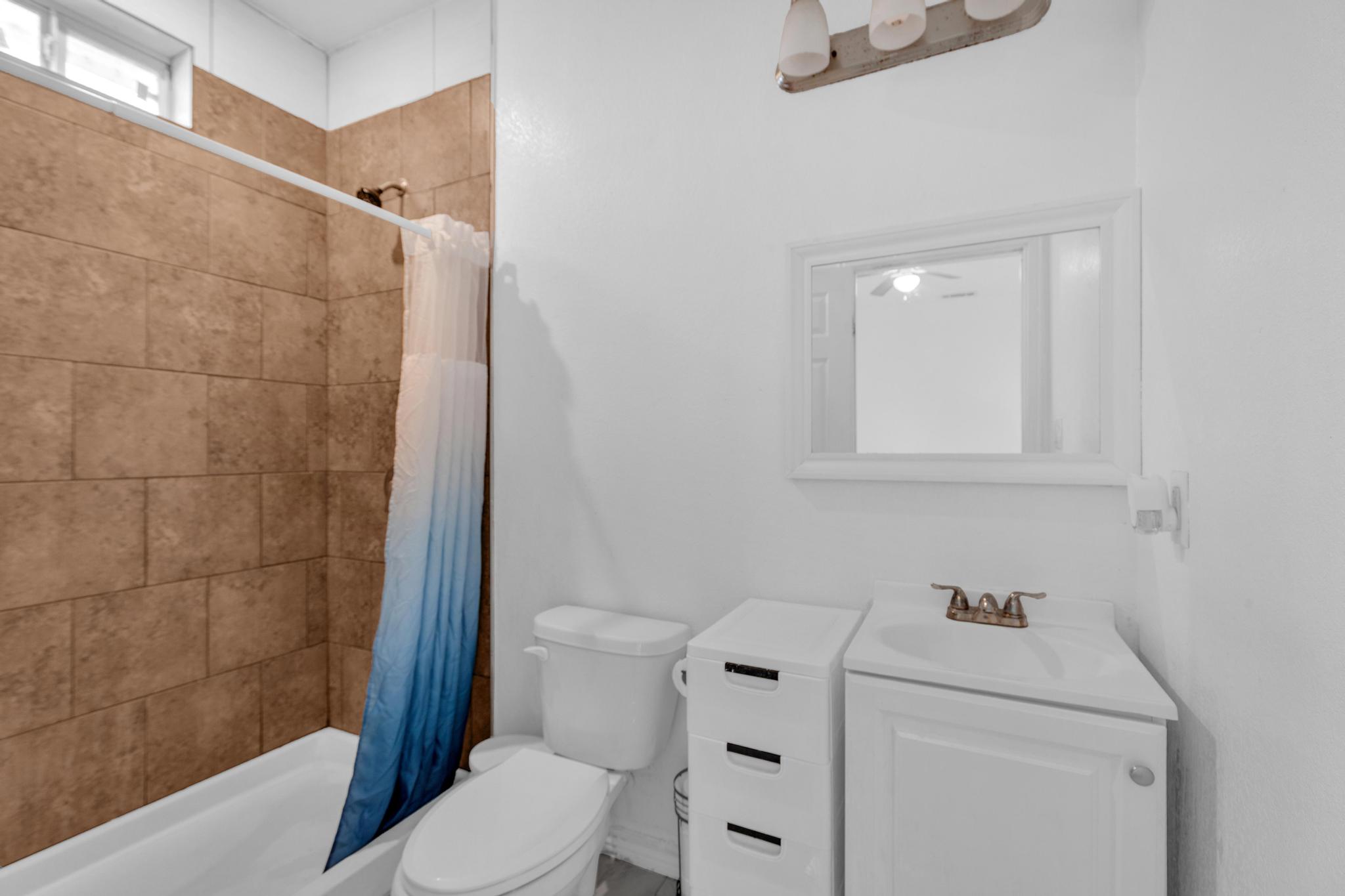 114 Crepe Myrtle Parkway Elgin, TX 78621 - Photo 17 of 40 Unit A - Full bath featuring vanity and a tile shower
