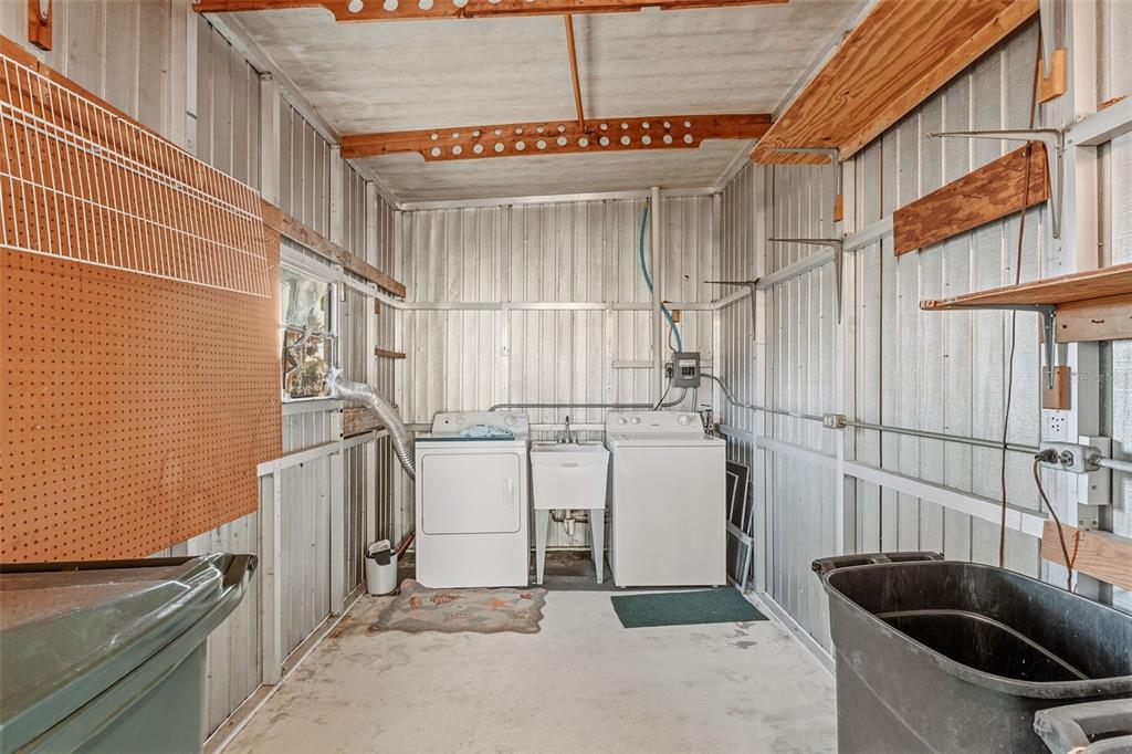 119 Lazy River Road North Port, FL 34287 - Photo 15 of 76 a view of a storage & utility room