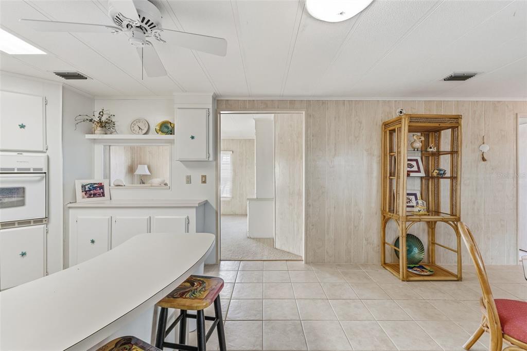 119 Lazy River Road North Port, FL 34287 - Photo 17 of 76 a dining room with furniture and window