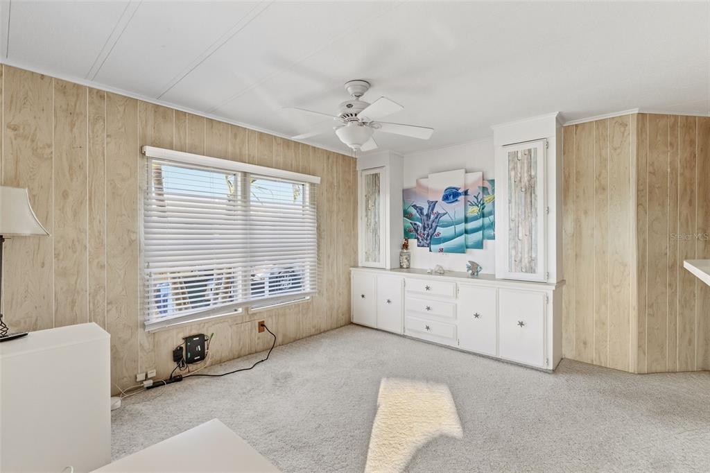 119 Lazy River Road North Port, FL 34287 - Photo 25 of 76 a living room with furniture and a window