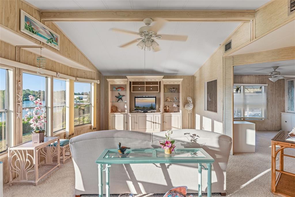 119 Lazy River Road North Port, FL 34287 - Photo 30 of 76 a living room with furniture and wooden floor