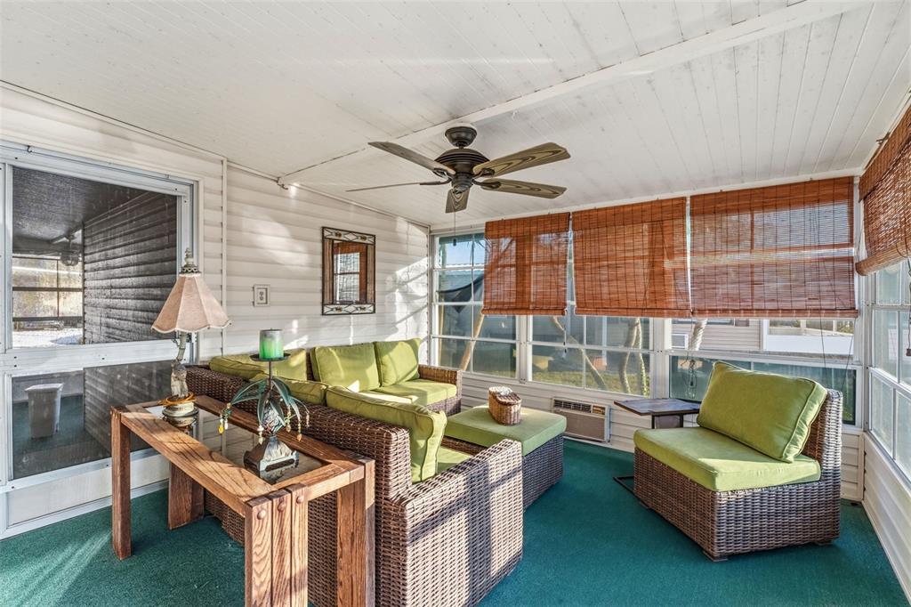 119 Lazy River Road North Port, FL 34287 - Photo 31 of 76 a living room with furniture and a window