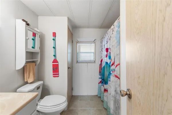 an aerial view of lake residential house with outdoor space