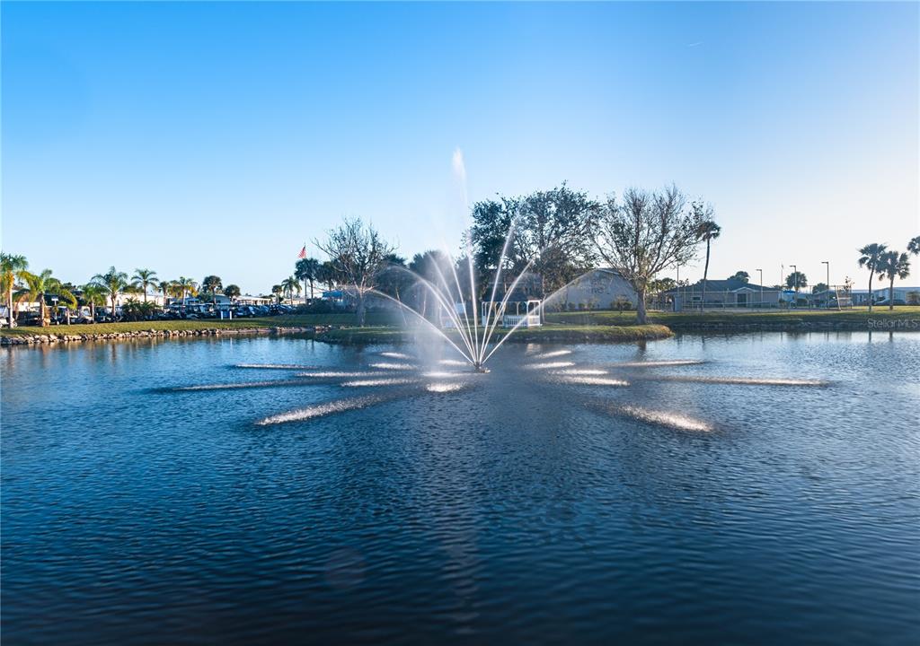 119 Lazy River Road North Port, FL 34287 - Photo 57 of 76 a view of a lake with houses