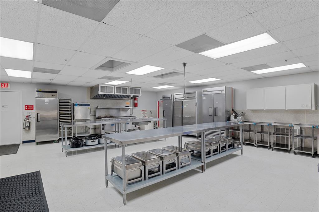 119 Lazy River Road North Port, FL 34287 - Photo 58 of 76 a living room with lots of furniture and a chandelier