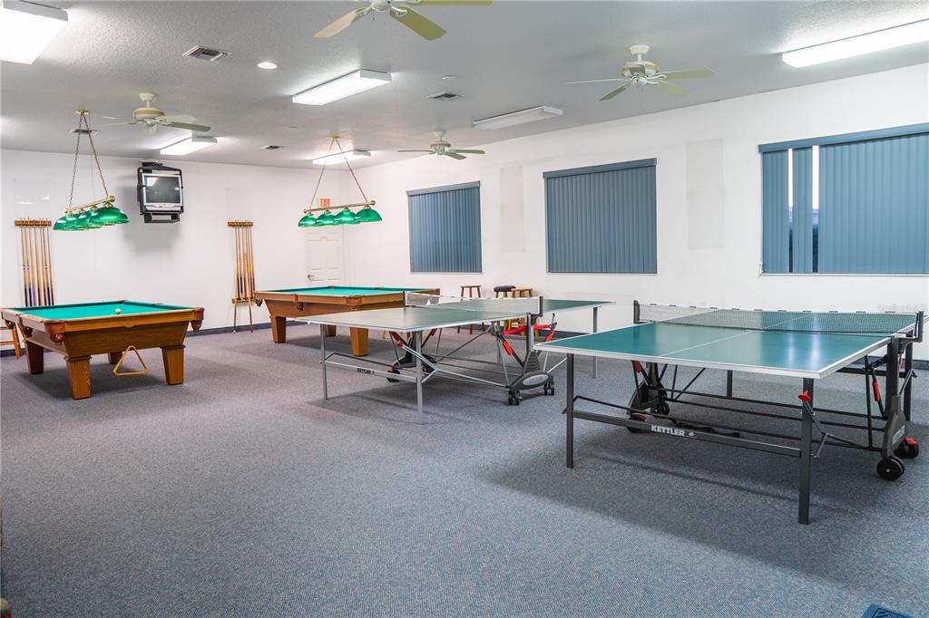 119 Lazy River Road North Port, FL 34287 - Photo 74 of 76 a living room with furniture and a table