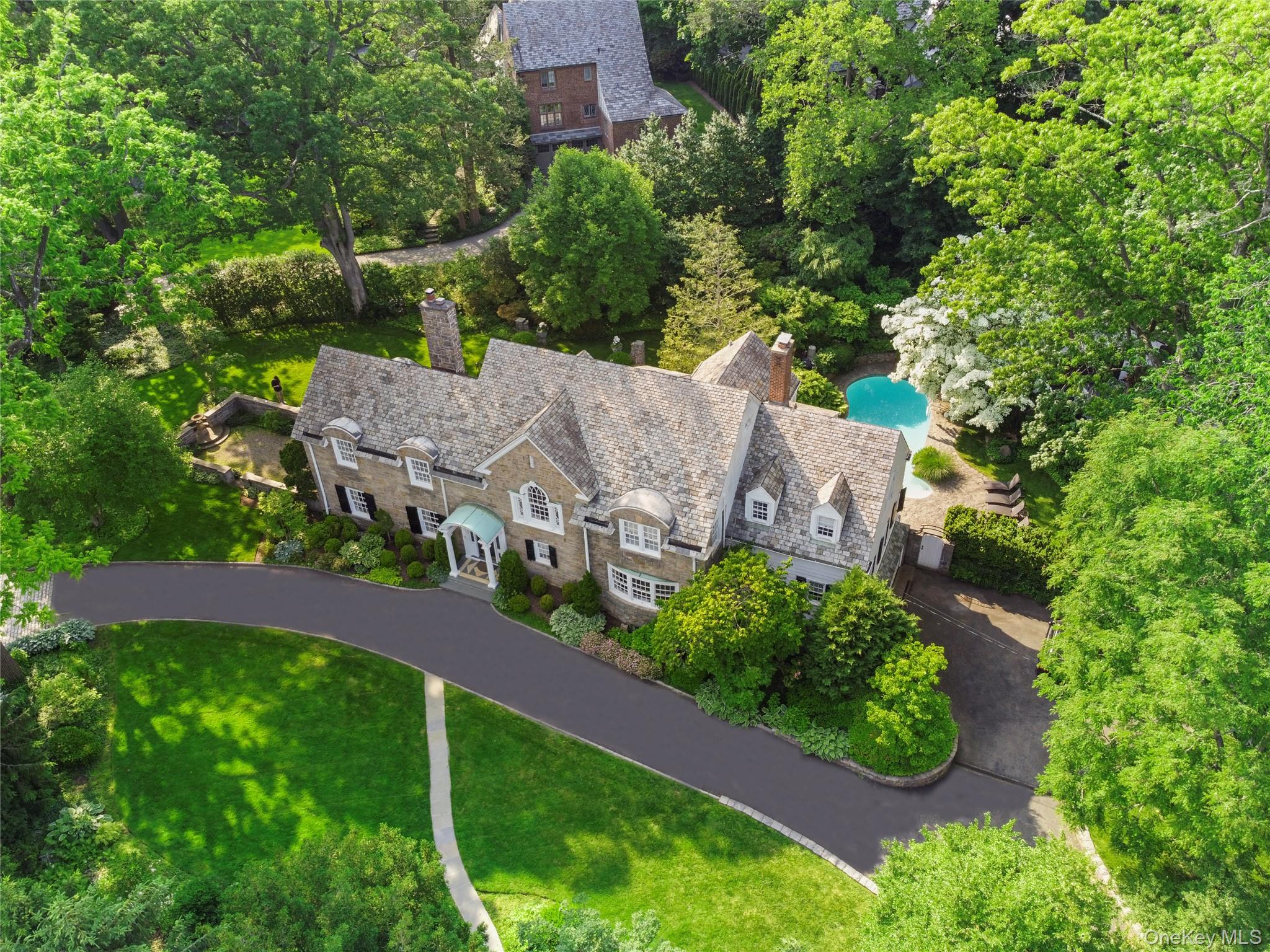 139 Hampshire Road Bronxville, NY 10708 - Photo 1 of 47 an aerial view of a house with a yard