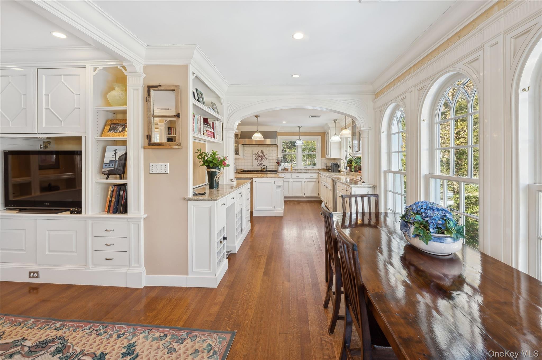 139 Hampshire Road Bronxville, NY 10708 - Photo 11 of 47 a living room with furniture and flat screen tv