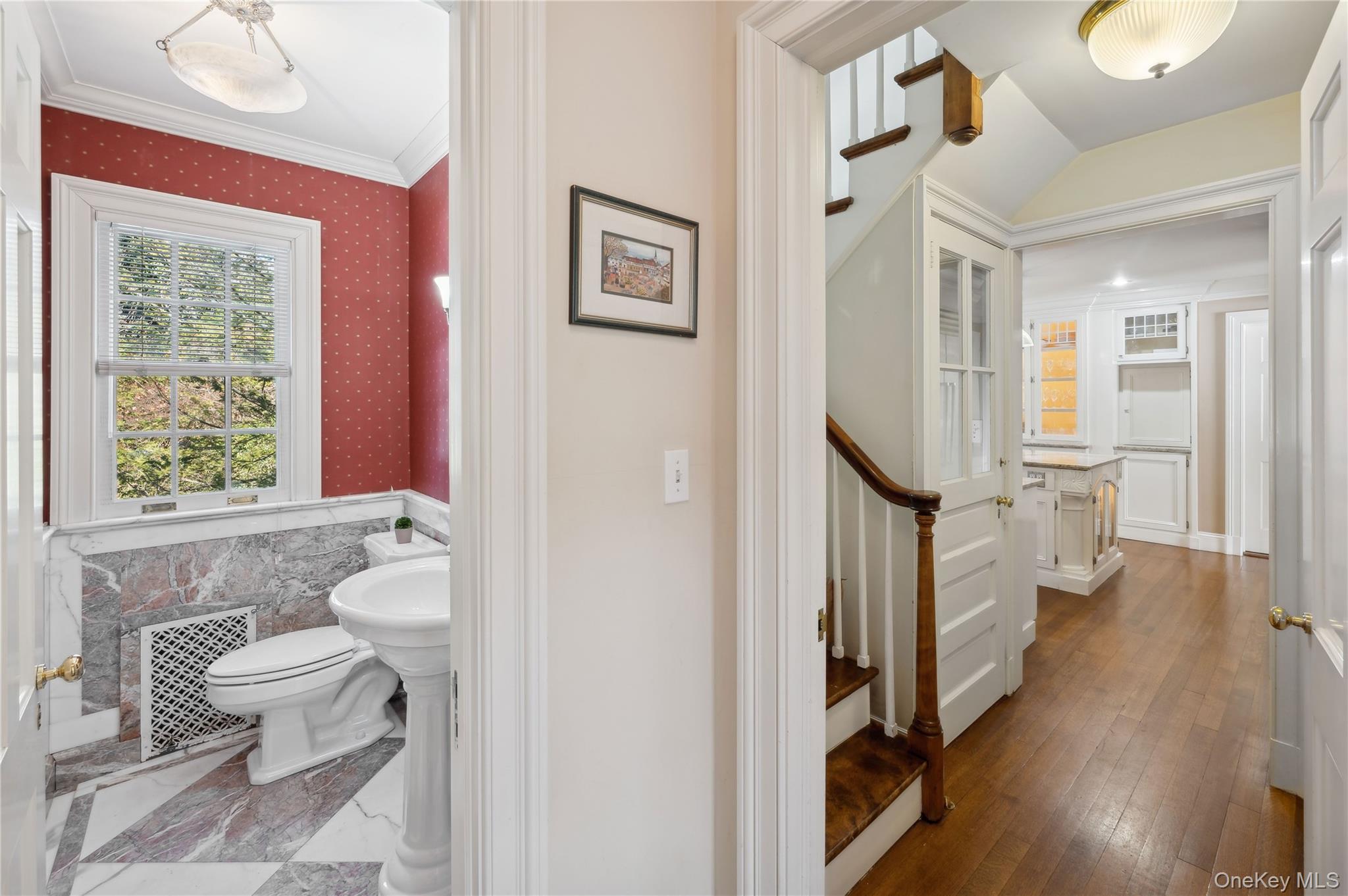 139 Hampshire Road Bronxville, NY 10708 - Photo 17 of 47 a bathroom with a toilet sink and a mirror