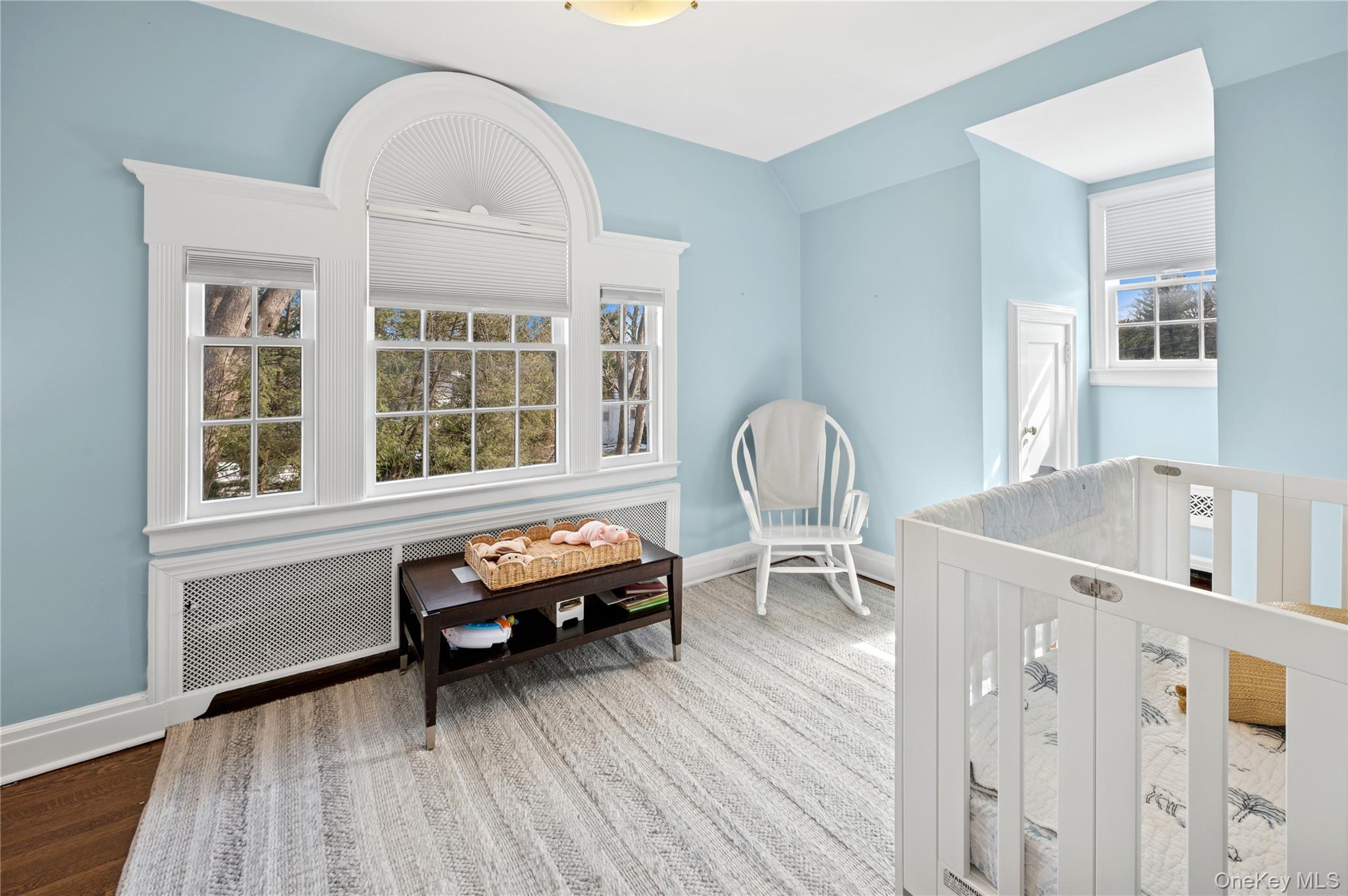 139 Hampshire Road Bronxville, NY 10708 - Photo 30 of 47 a living room with furniture and a wooden floor