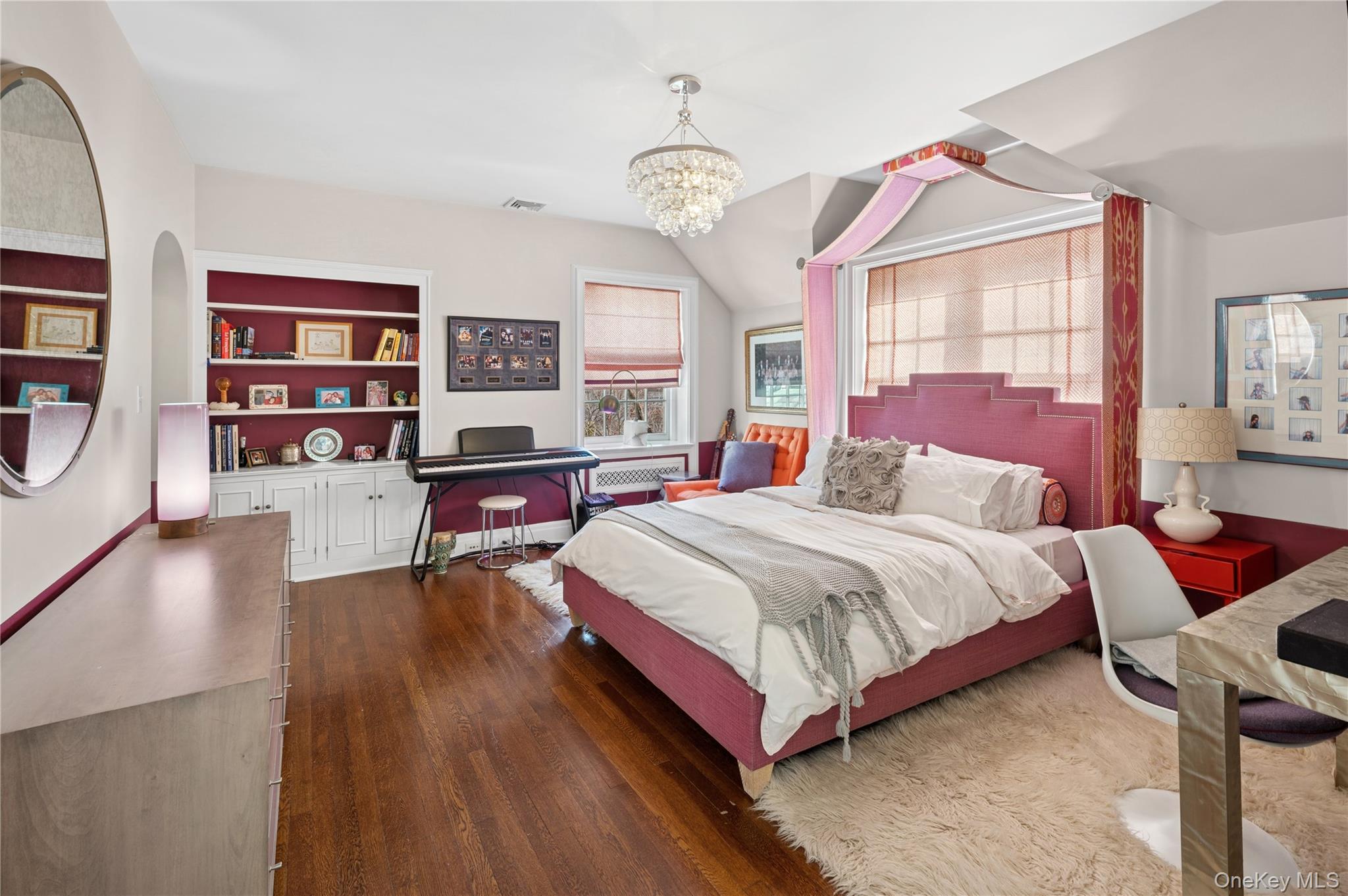 139 Hampshire Road Bronxville, NY 10708 - Photo 32 of 47 a spacious bedroom with a bed and wooden floor