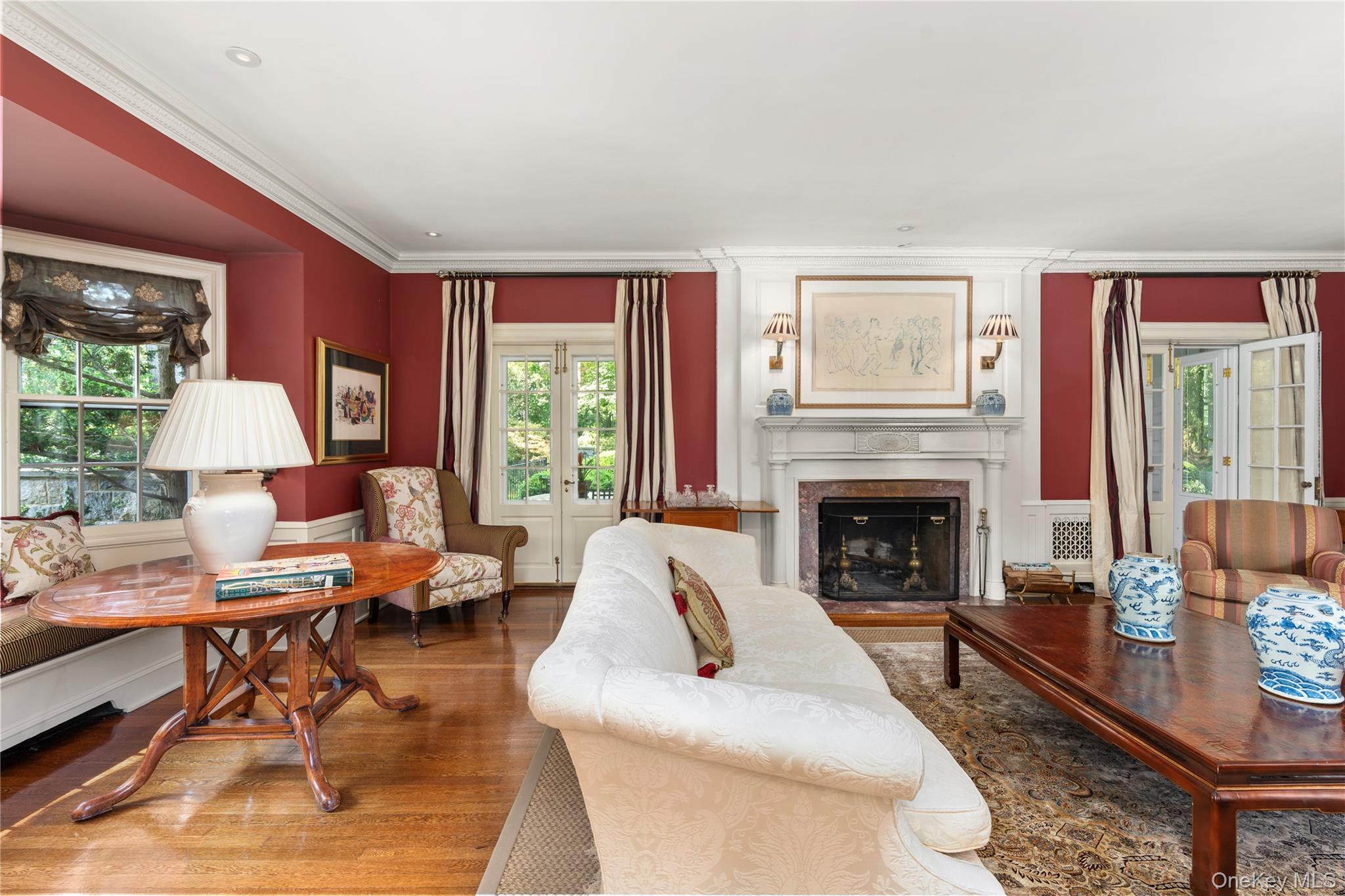139 Hampshire Road Bronxville, NY 10708 - Photo 5 of 47 a living room with furniture and a fireplace