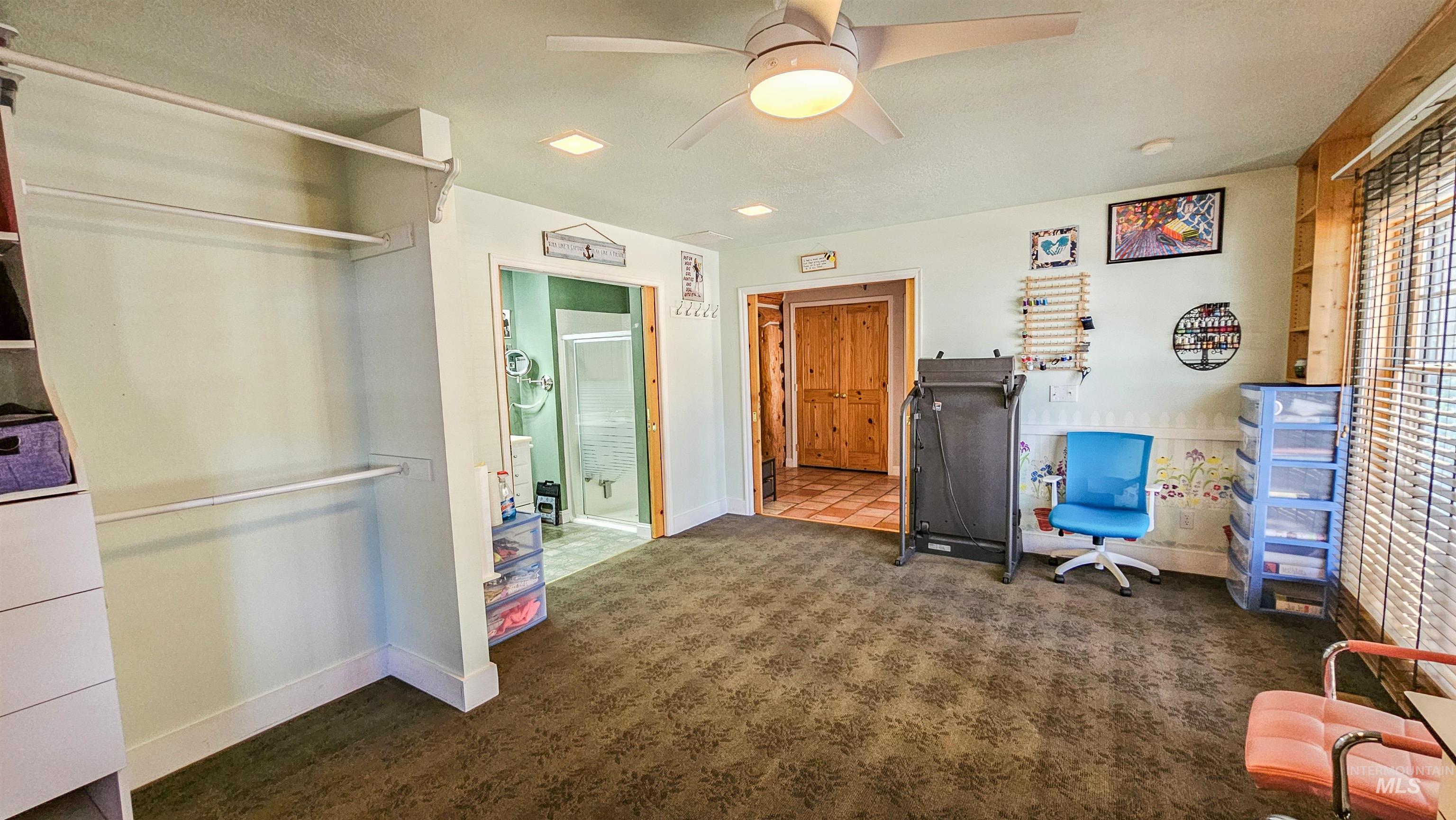 3382 Highway 21 Boise, ID 83716 - Photo 14 of 50 Back of house with a sunroom, a metal roof, and entry steps