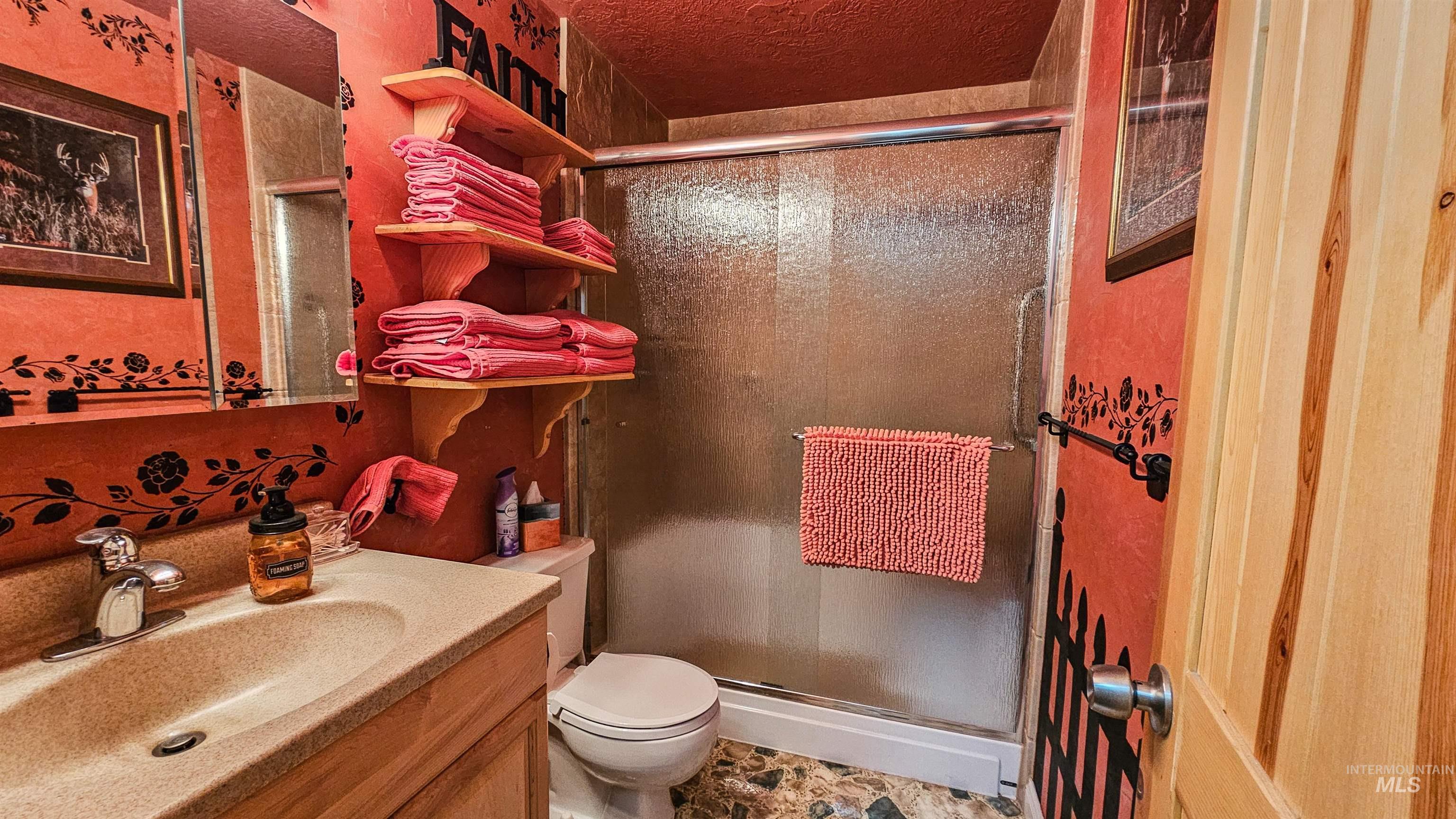 3382 Highway 21 Boise, ID 83716 - Photo 18 of 50 Bathroom with vanity and a stall shower