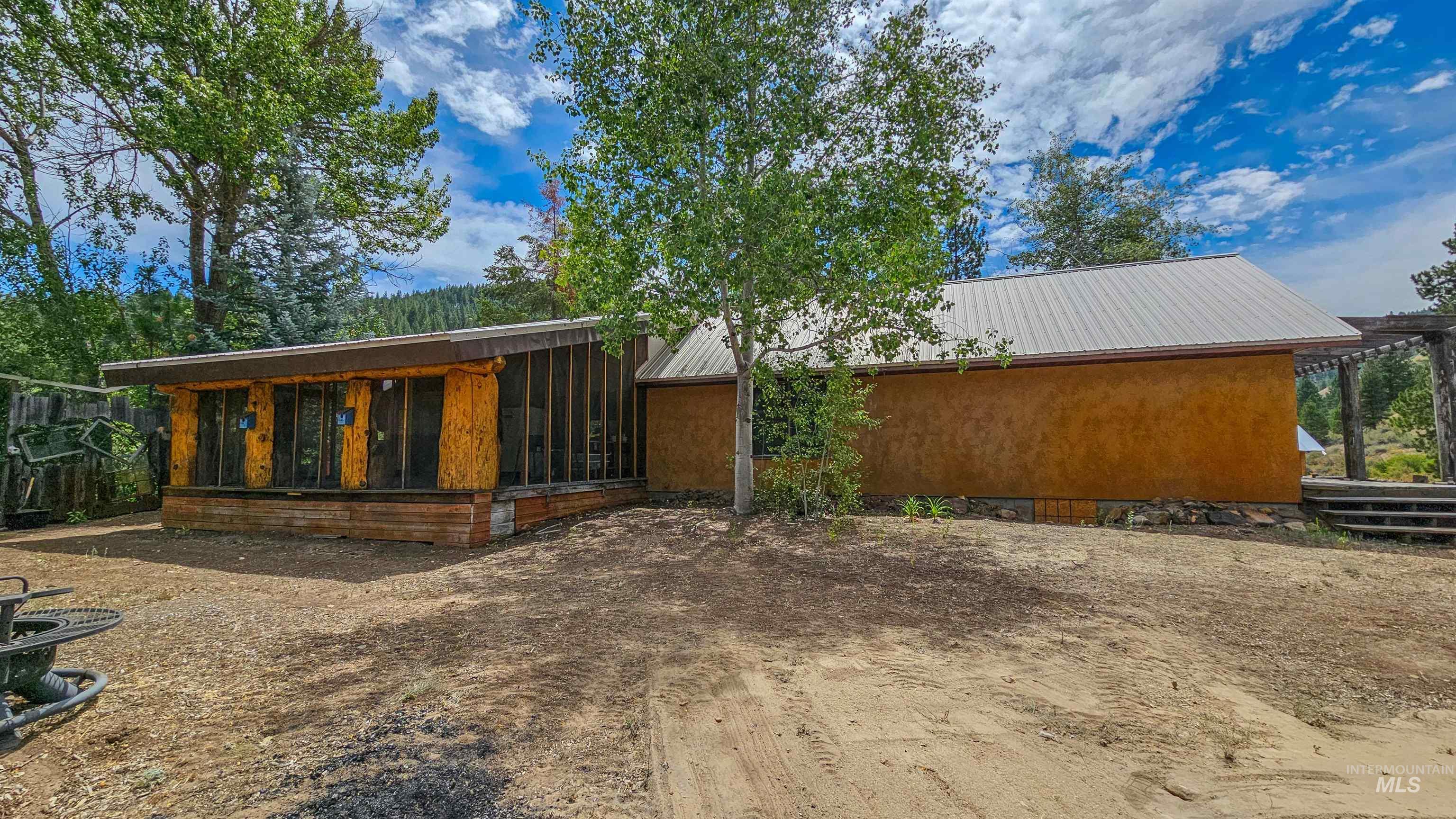 3382 Highway 21 Boise, ID 83716 - Photo 29 of 50 View of front facade featuring a sunroom and a metal roof