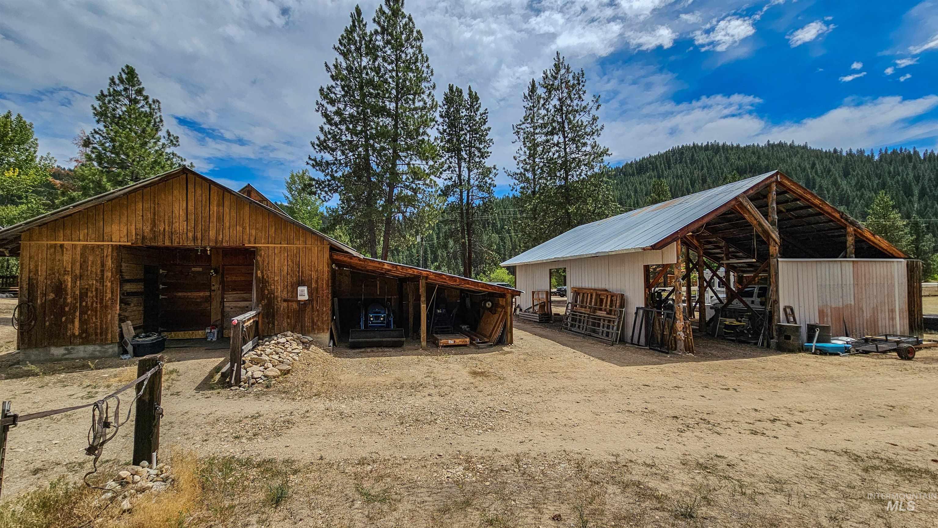 3382 Highway 21 Boise, ID 83716 - Photo 41 of 50 Horse barn featuring a view of trees
